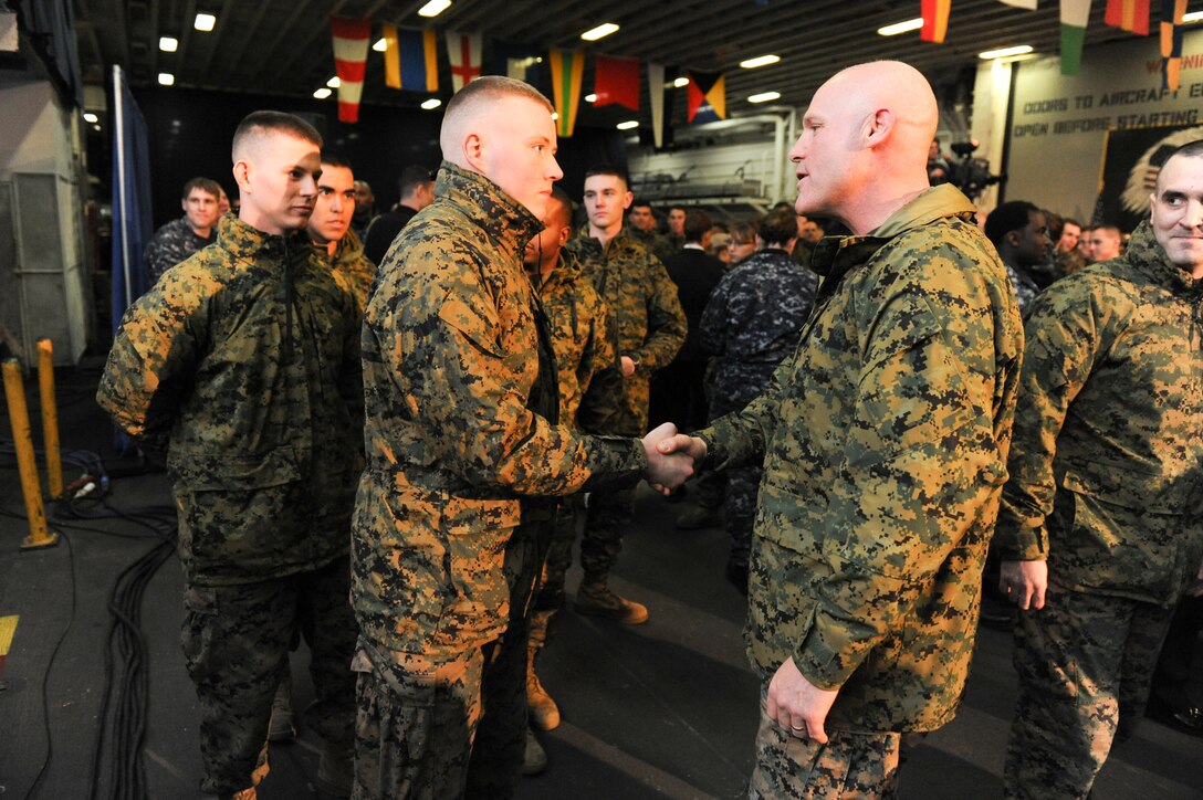 Sgt. Maj. Micheal P. Barrett, the 17th Sergeant Major of the Marine Corps, attends the 21st Century Sailor and Marine Rollout aboard the USS Bataan in Norfolk, Va., March 5, 2012.