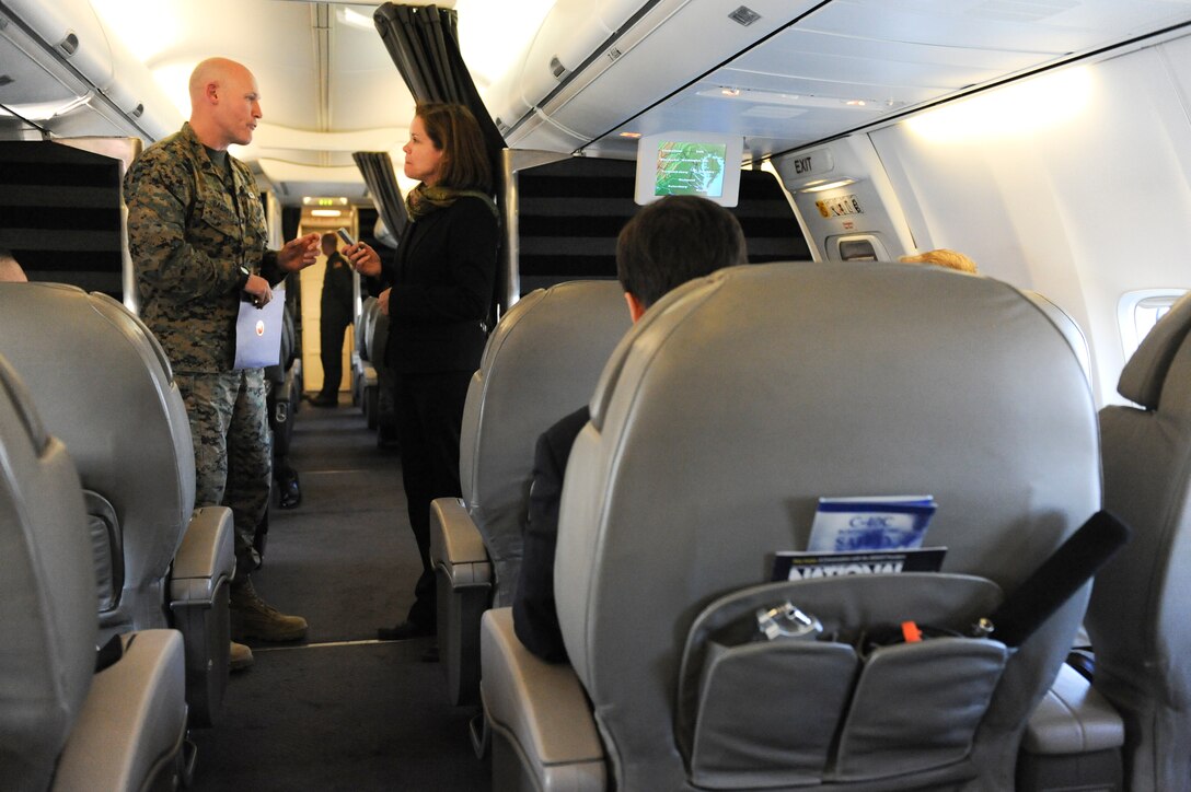 Gina Cavallaro, a reporter with Marine Corps Times, interviews Sgt. Maj. Micheal P. Barrett, the 17th Sergeant Major of the Marine Corps, after the 21st Century Sailor and Marine Rollout aboard a plane in Norfolk, Va., March 5, 2012. More images of Sgt. Maj. Barrett are available at http://www.marines.mil/unit/hqmc/smmc/Pages/photos.aspx