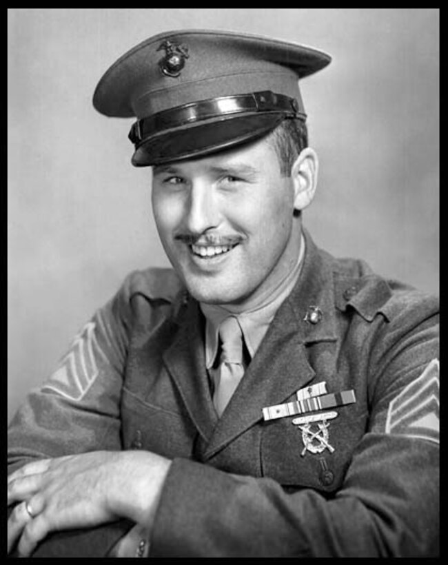 MARINE CORPS BASE CAMP LEJEUNE, N.C. -Staff Sgt. Norman Hatch poses for a picture in his early years as a Marine and later retired as a major. Hatch was a combat cameraman and documented the harsh war fighting during the Pacific campaign of Word War II. He is most recognized for his film, With the Marines at Tarawa, which won the 1944 Academy Award for Best Short Documentary.