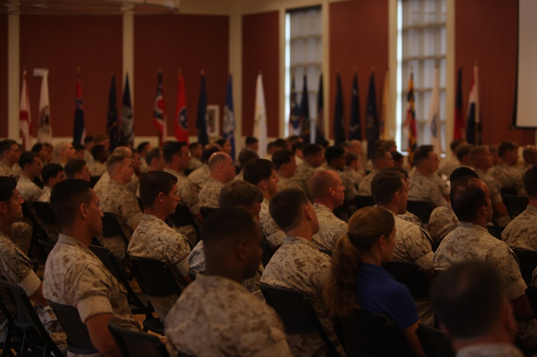 Marines and Sailors of 3d Marine Special Operations Battalion, U.S. Marine Corps Forces, Special Operations Command, listen to Lt. Col. J. Darren Duke, commander of 3d MSOB, deliver a speech at a 9/11 memorial ceremony aboard Camp Lejeune, N.C. Sept.7. September was a month of rememberance and reflection, marked by several ceremonies taking place throughout MARSOC to honor its fallen warriors and the victims of 9/11.