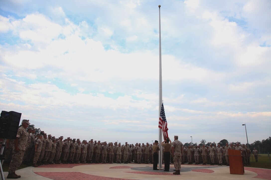 The flag is raised at U.S. Marine Corps Forces, Special Operations Command headquarters during a 9/11 memorial ceremony aboard Camp Lejeune, N.C. Sept.12. September was a month of rememberance and reflection, marked by several ceremonies taking place throughout MARSOC to honor its fallen warriors and the victims of 9/11.