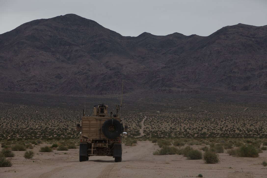 A U.S. Marine Corps Forces, Special Operations Command M-ATV rolls toward the mountains during a simulated convoy as part of a pre-deployment exercise at the National Training Center, Fort Irwin, Calif. May 15, 2011. The three-week exercise is designed to prepare MARSOC Marines for deployment to combat operations in Afghanistan by immersing them in an environment as realistic and comprehensive as possible.