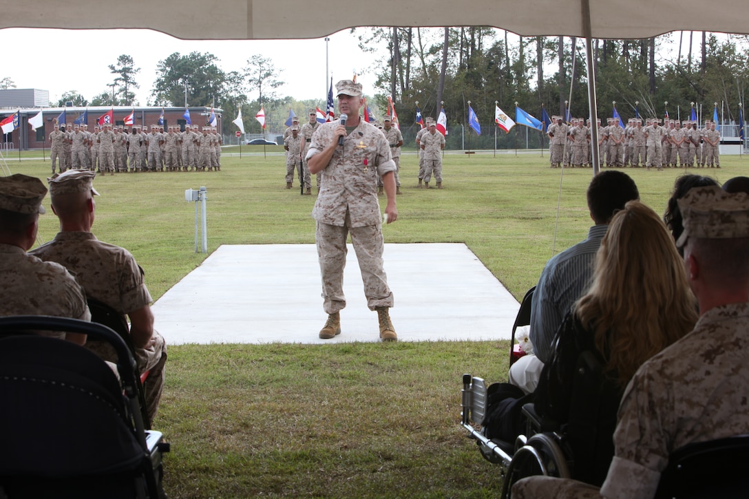 Sgt. Maj. Richard W. Ashton, former sergeant major of U.S. Marine Corps Forces, Special Operations Command, addresses a crowd of Marines, Sailors, friends and family during a post and relief ceremony aboard Camp Lejeune, N.C. Sept. 30. As oncoming Sgt. Maj. Thomas F. Hall prepares to take the reins as MARSOC's top senior-enlisted, Ashton is retiring after 32 years of service.
