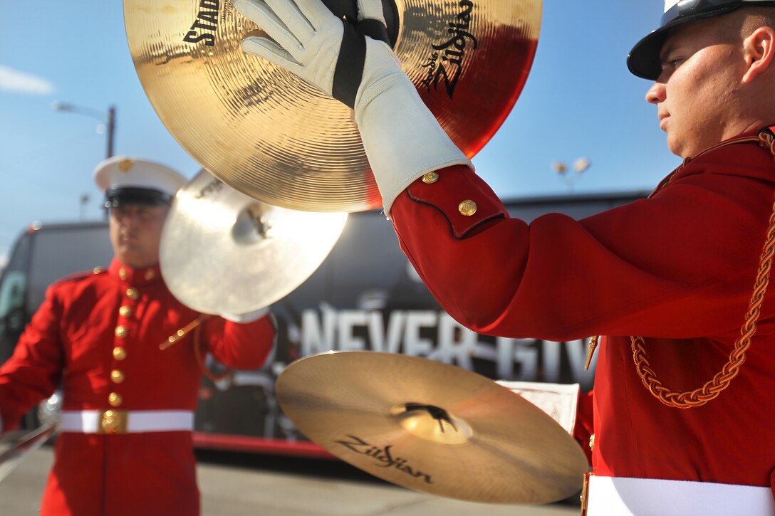 Percussionists with the United States Marine Corps Drum and Bugle Corps, practice before their Battle Color Ceremony at Lance Cpl. Torrey L. Grey Field Feb. 7, 2012. The Ceremony entertained spectators with a variety of musical tunes and melodies.