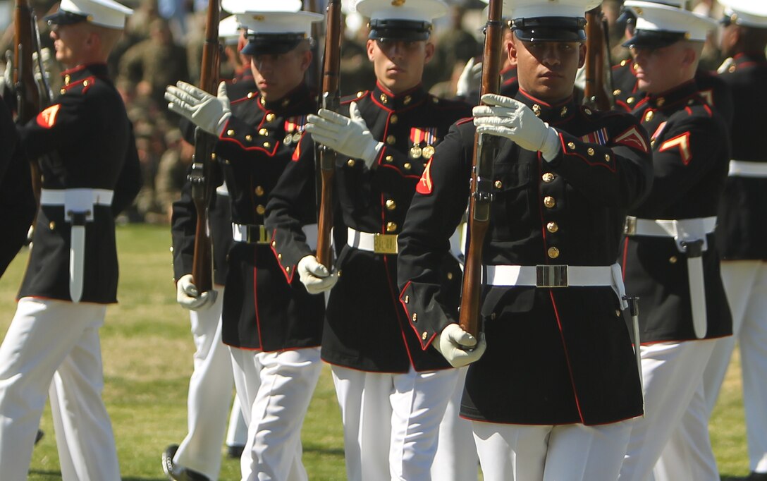 The United States Marine Corps Silent Drill Platoon perform a routine as part of the Battle Color Ceremony at Lance Cpl. Torrey L. Grey Field Feb. 7, 2012.