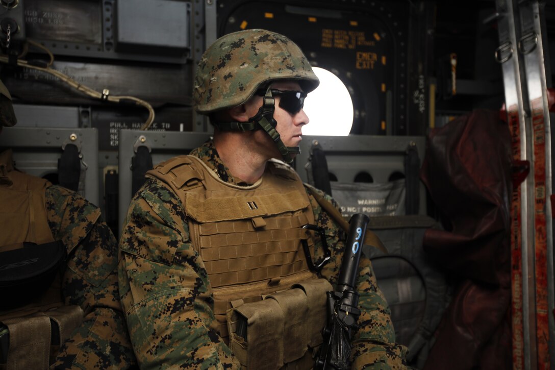 Capt. Leonard J. Niedosik, the Battery A 2nd Low Altitude Air Defense Battalion commanding officer keeps an eye on 5.56mm ammunition and practice Stinger Missles while the unit transports it via MV-22B Ospreys to Air Force Dare County Bombing Range Mar. 7. Marine Medium Tiltrotor Squadron 266 assisted 2nd LAAD with the transportation of their ammo by aircraft in support of Exercise Sandman, a training evolution designed around combat communication operations.