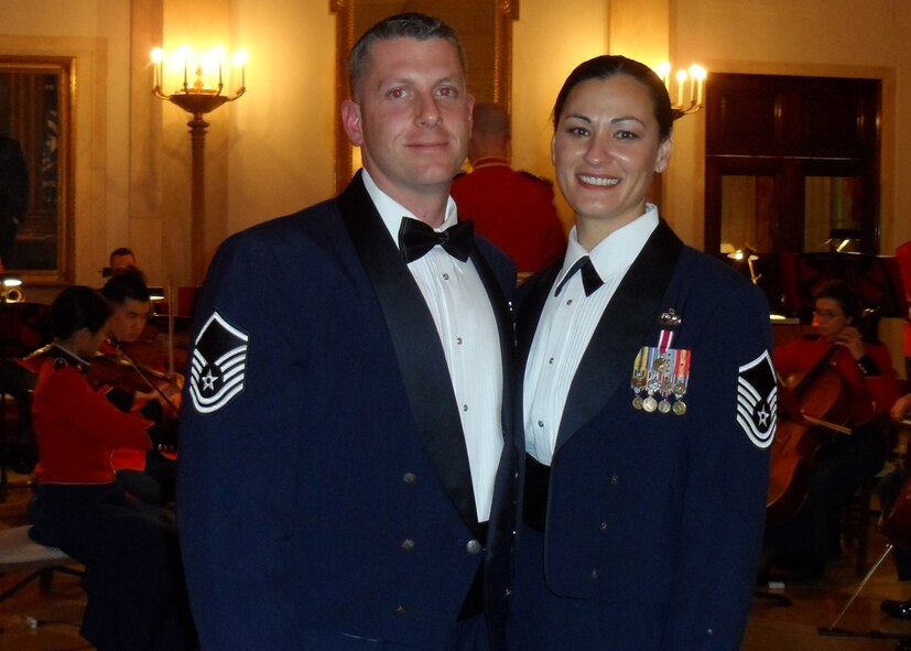U.S. Air Force Master Sgt. Jessica Coombs, superintendent of air terminal operations center and husband Master Sgt. Jeremy Coombs, superintendent of passenger operations, both from the 733d Air Mobility Squadron pose for a photo while in the East Room of the White House. They were invited to have dinner with President Barack Obama and First Lady Michelle Obama during an event dubbed “A Nation’s Gratitude”: Honoring Those Who Served in Operation Iraqi Freedom and Operation New Dawn. (U.S. Air Force courtesy photo/released)