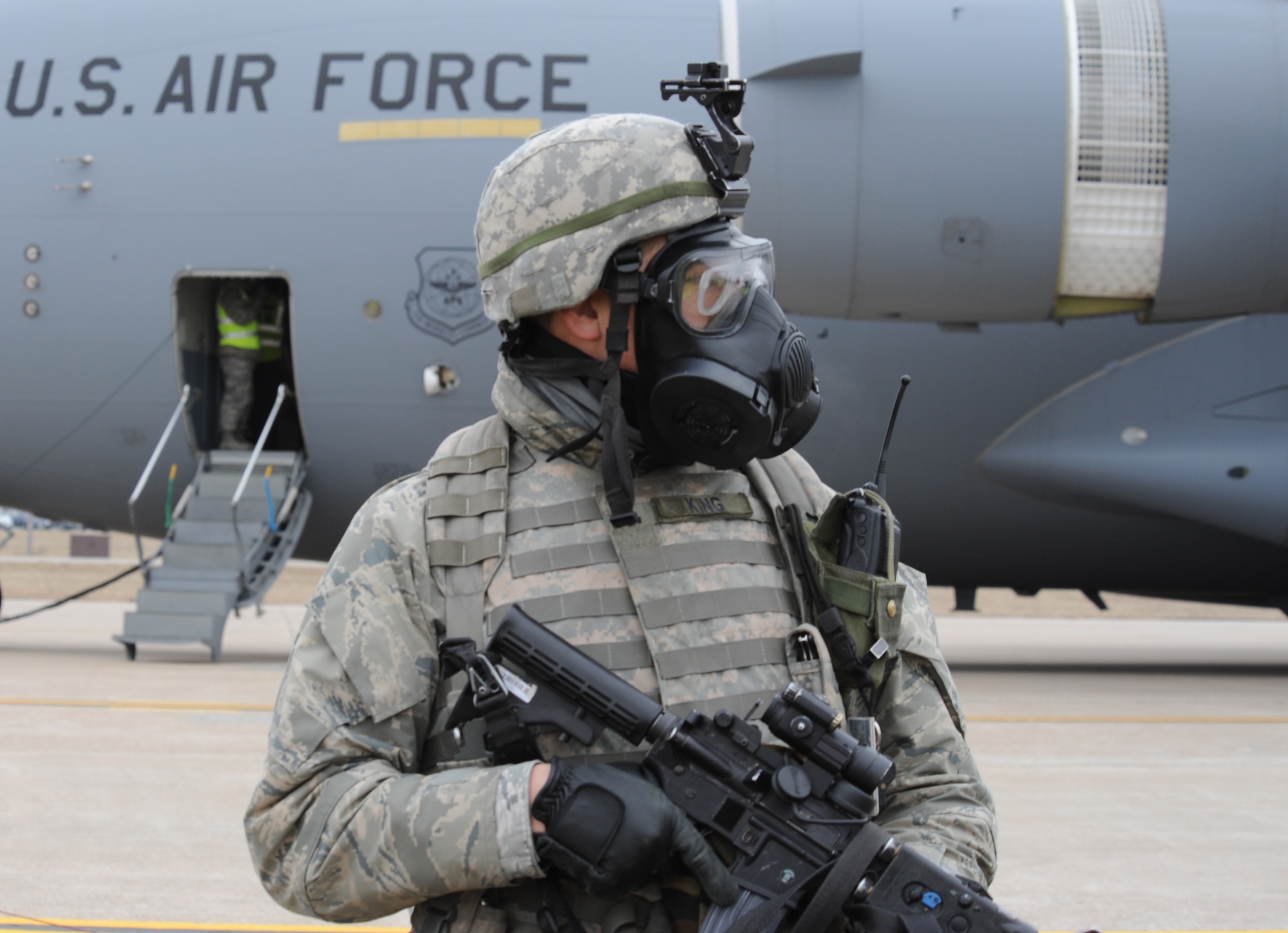 WHITEMAN AIR FORCE BASE, Mo. -- A member of the 509th Security Forces Squadron stands guard by a C-17 Globemaster during a Nuclear Surety Inspection Jan. 21. Whiteman AFB finished the NSI with 22 teams and 27 individuals recognized as superior performers. (U.S. Air Force photo/Airman 1st Class Bryan Crane)
