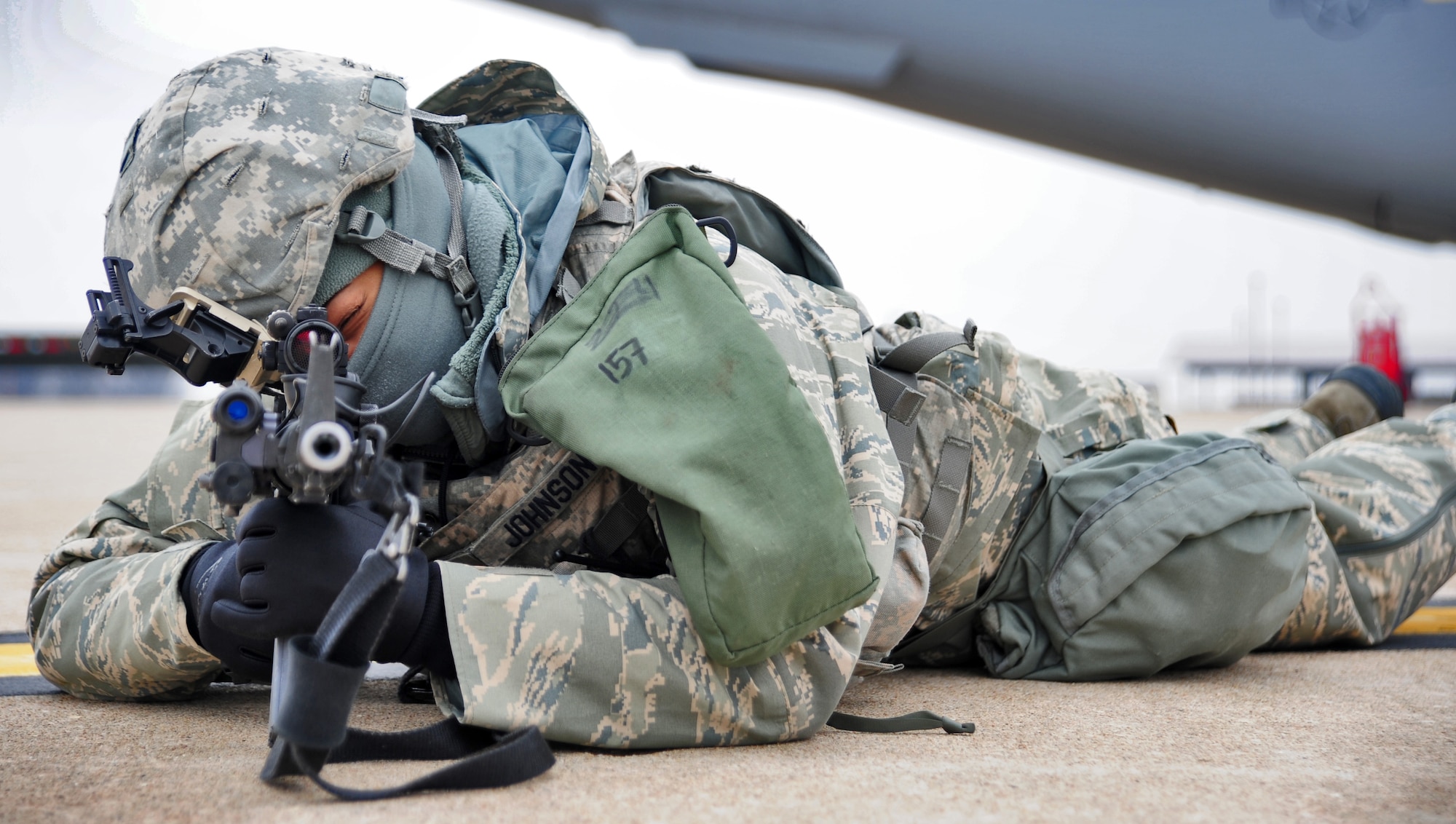 WHITEMAN AIR FORCE BASE, Mo. – Airman 1st Class Keena Johnson, 509th Security Forces Squadron patrolman, provides security for a C-17 Globemaster during a nuclear surety inspection Jan. 20. This NSI was a detailed assessment designed to evaluate the unit’s ability to carry out its nuclear mission. Areas evaluated encompassed technical operations, management and administration, security, logistics movement, safety, maintenance facilities and supply support.  (U.S. Air Force photo/Senior Airman Nick Wilson)