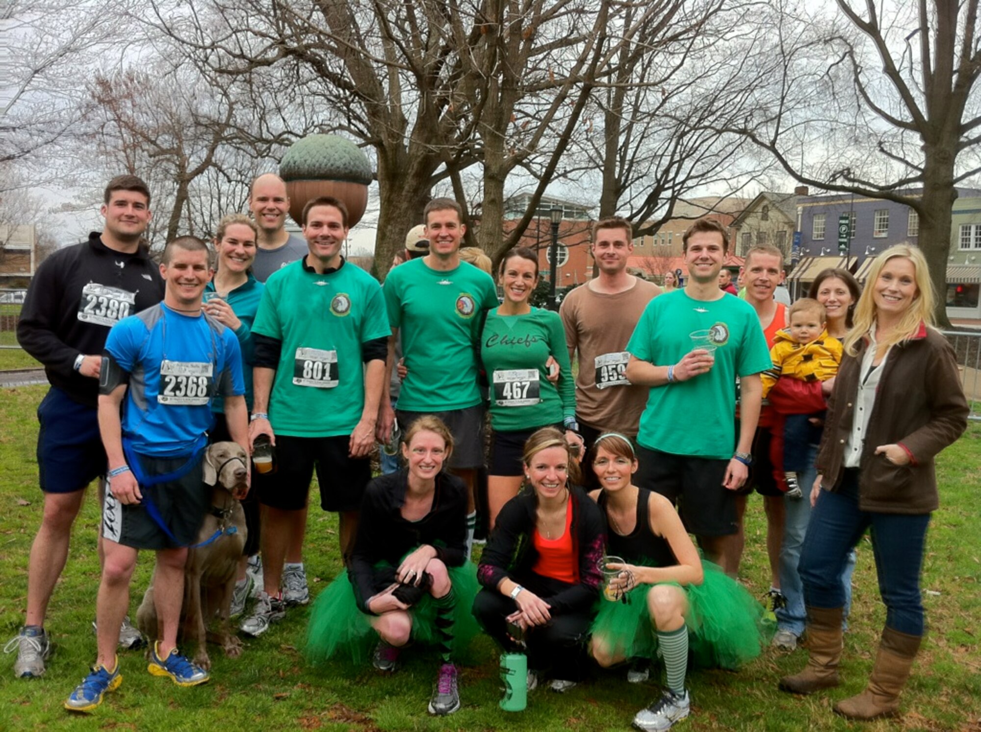 Airmen from the 335th and 336th Fighter Squadrons and spouses pose for a photo after completing the St. Paddy’s Day 8k in Raleigh, N.C. The racers in green represented members of the 335th FS from Seymour Johnson Air Force Base, N.C., who are currently deployed in support of Operation Enduring Freedom. (Courtesy photo)