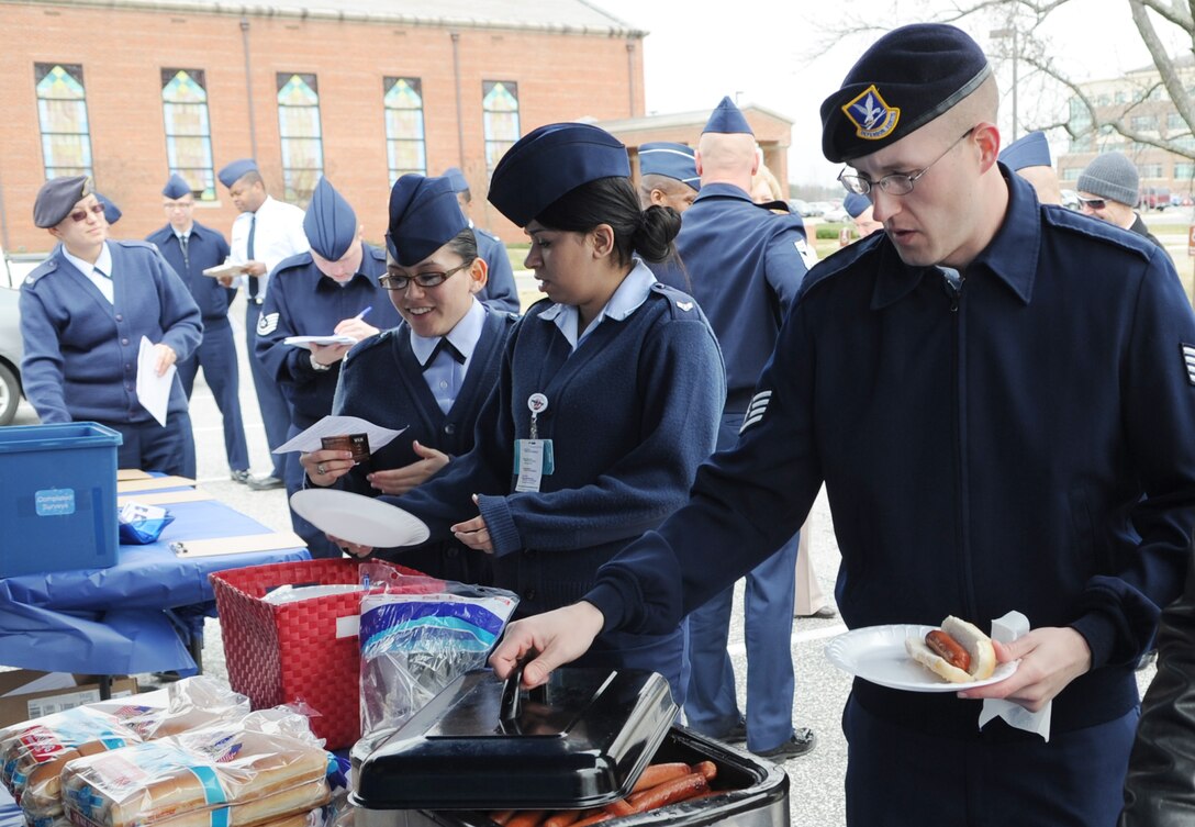 Service members enjoy the USO luncheon March 5 on Joint Base Andrews, Md. The luncheon coincided with a survey aimed at learning the needs of active duty military and dependents stationed in the Washington, D.C., and Baltimore, Md., area. The survey allows the USO to improve programs aimed at benefitting service members. (U.S. Air Force photo by Tech. Sgt. Raymond Mills)