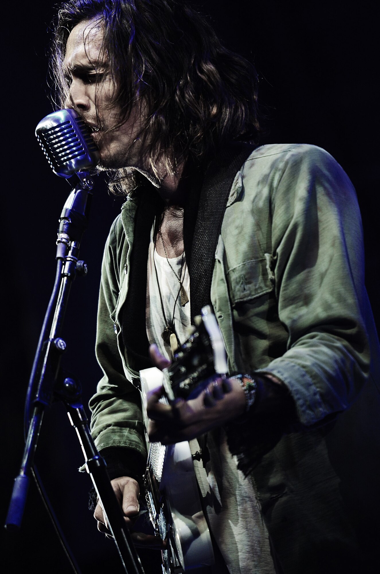 WRIGHT-PATTERSON AIR FORCE BASE, Ohio – Senior Airman took first place in the 2011 Air Force Reserve Command Media Contest’s portrait/personality photograph category with this photograph of Brandon Boyd, vocalist for the rock band Incubus, singing their hit song, “If not, now when?” during a performance at the Charter One Pavilion, Chicago, Ill. Aug. 21, 2011. (U.S. Air Force photo/Senior Airman Mikhail Berlin)