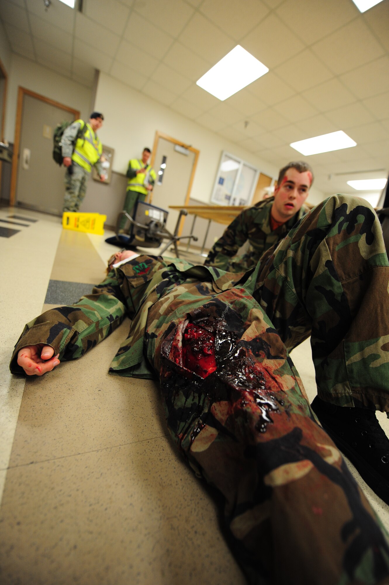 WHITEMAN AIR FORCE BASE, Mo. -- Moulaged victims await medical assistance during an active shooter Major Accident Response Exercise Feb. 23. Active shooter training educates Airmen on how they can save lives in circumstances where an attacker’s only objective is to target as many victims as possible. (U.S. Air Force photo/Senior Airman Nick Wilson)