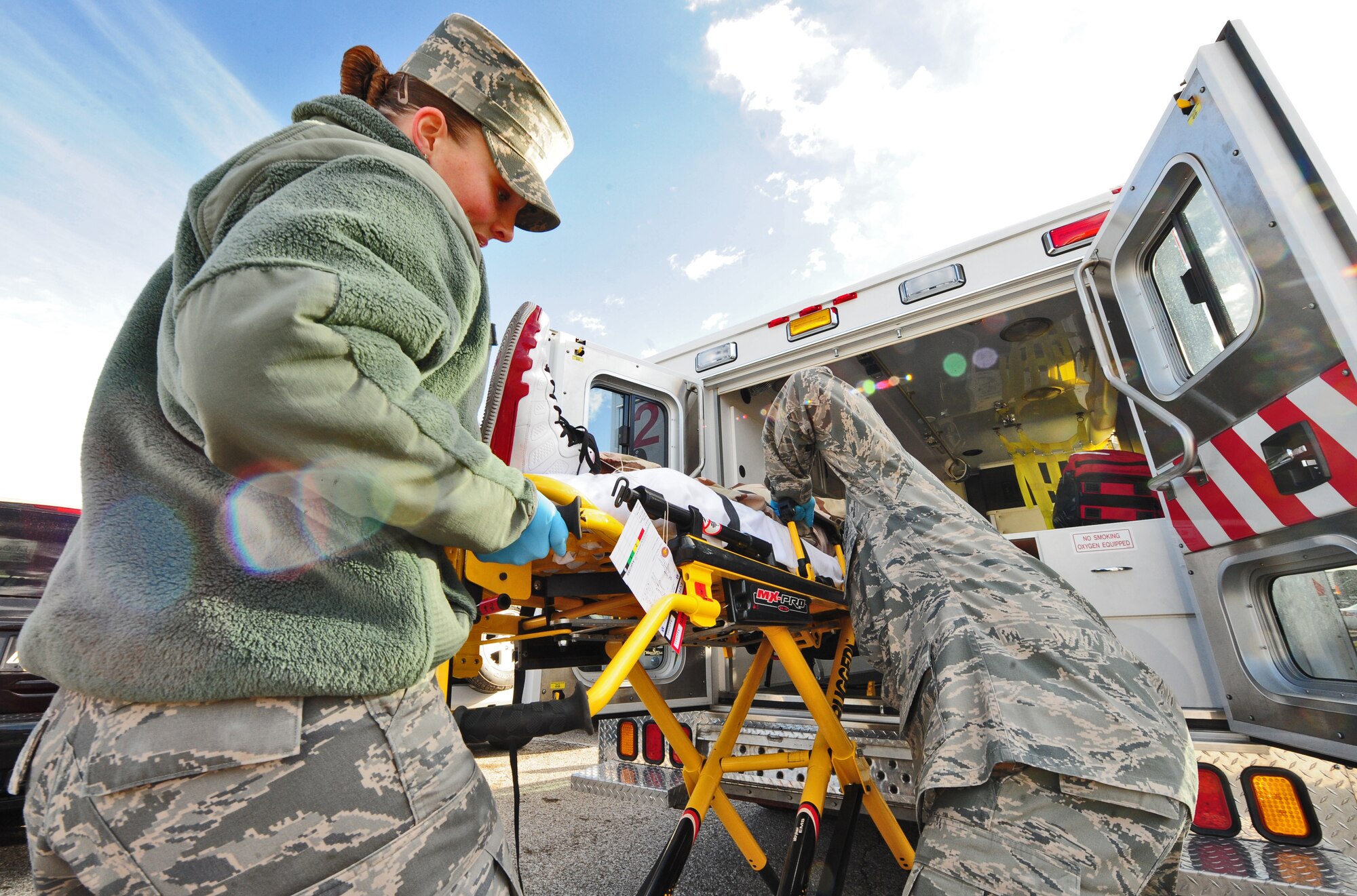 WHITEMAN AIR FORCE BASE, Mo.  -- First responders from the 509th Medical Group provide medical assistance to a moulaged victim during a Major Accident Response Exercise Feb. 23. The exercise allowed the emergency responders to utilize their training as they would during a real world incident, enabling them to be prepared should the worst occur. (U.S. Air Force photo/Senior Airman Nick Wilson)