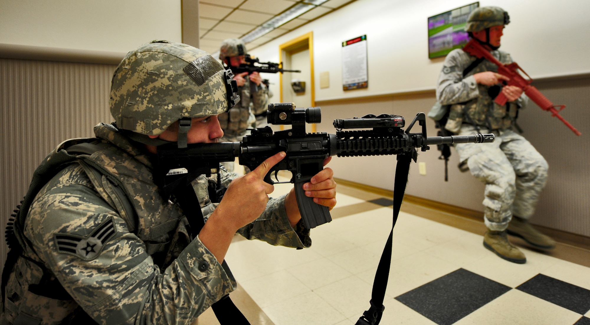 WHITEMAN AIR FORCE BASE, Mo. -- First responders from the 509th Security Forces Squadron arrive on scene to detain an active shooter during a Major Accident Response Exercise Feb. 23. The training enables security forces to move in and get to the source of the threat without waiting -- thus saving lives by moving quickly and effectively. (U.S. Air Force photo/Senior Airman Nick Wilson)