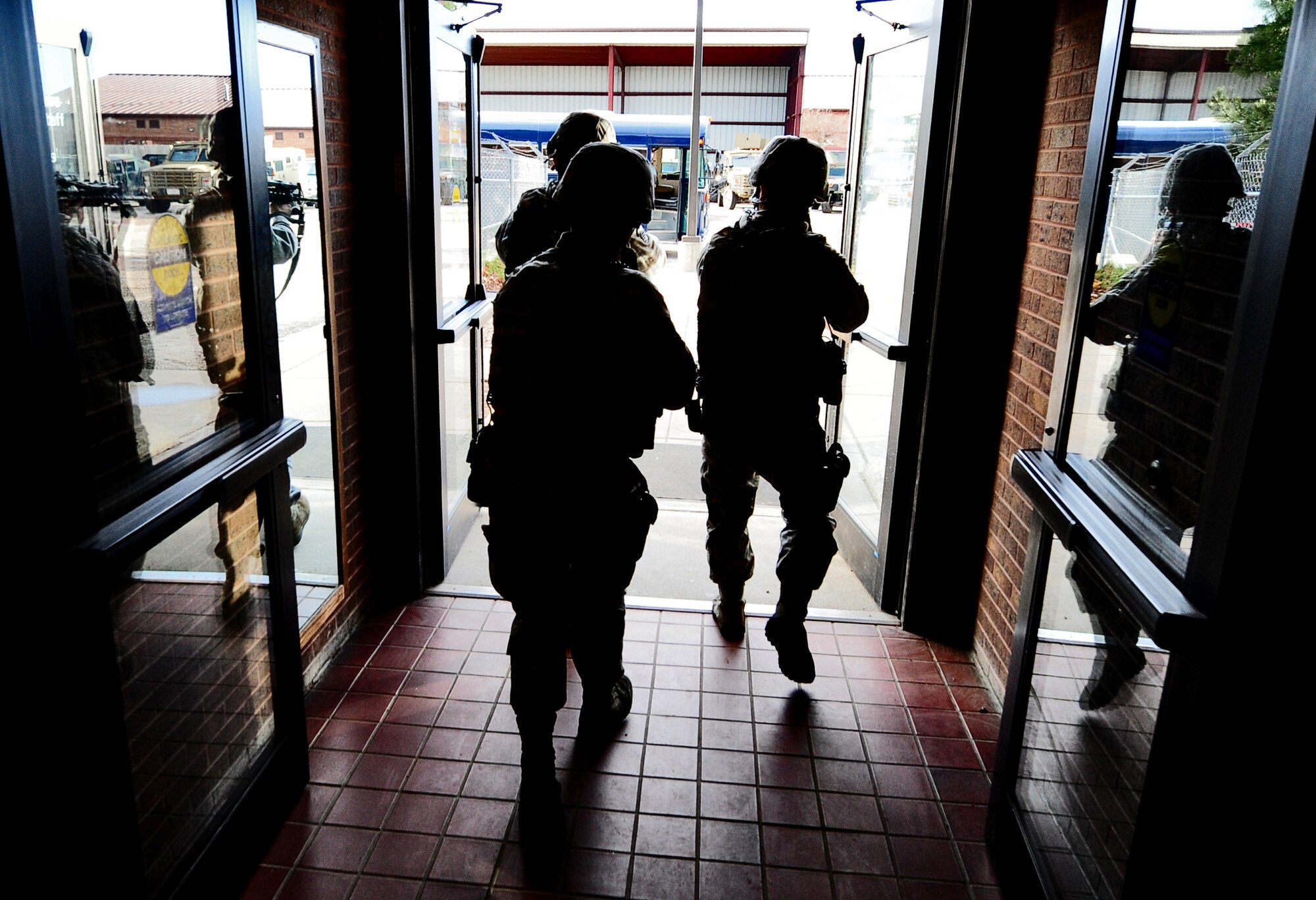 WHITEMAN AIR FORCE BASE, Mo. -- First responders from the 509th Security Forces Squadron search the area to locate and detain an active shooter during a Major Accident Response Exercise Feb. 23. The exercise forced Airmen to think outside of what would be done on a routine basis to focus on how they’d respond to a major emergency. (U.S. Air Force photo/Senior Airman Nick Wilson)