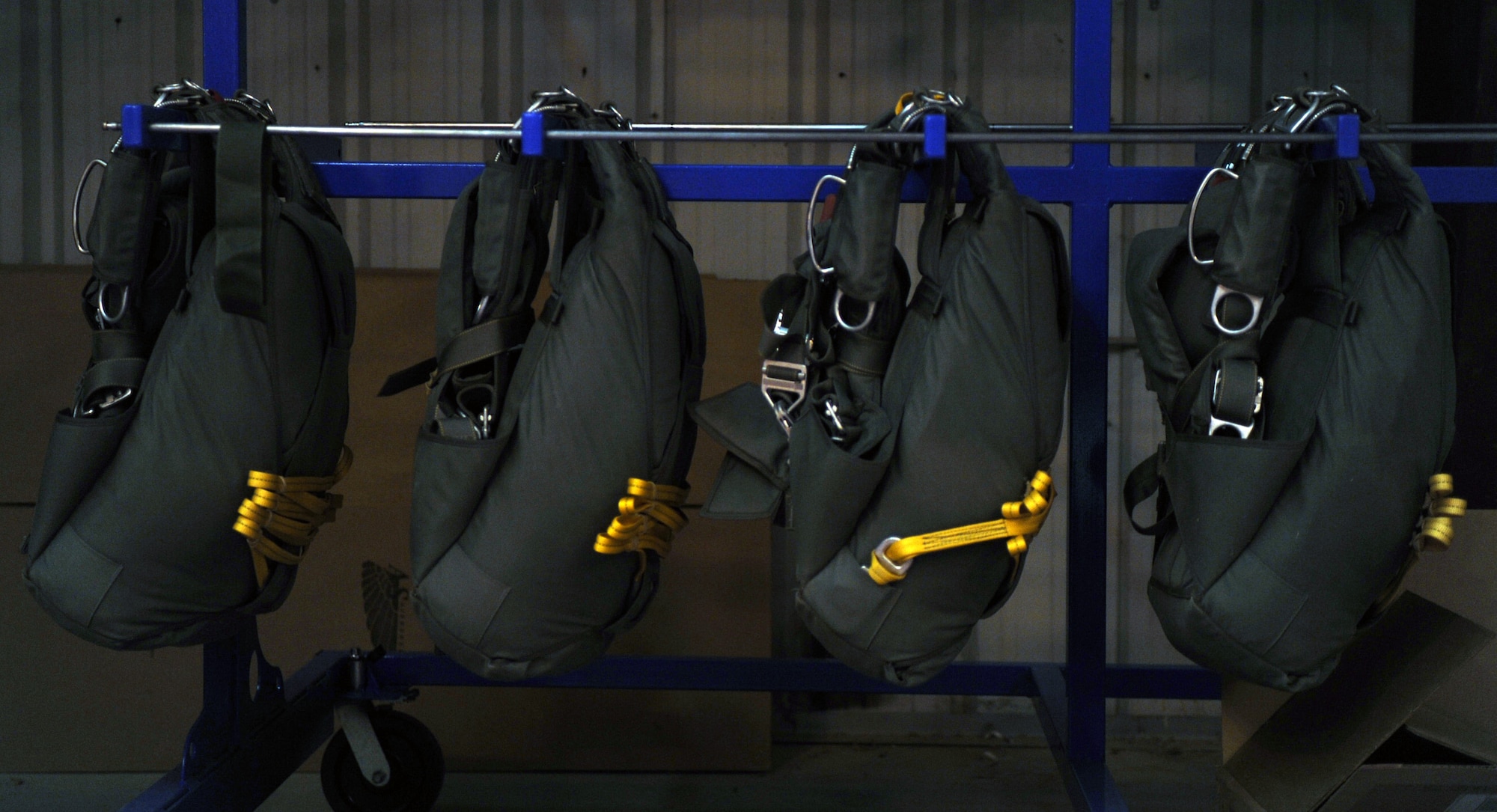 Parachutes hang ready for Joint Precision Airdrop System training Feb. 15, 2012, in Eloy, Ariz. JPADS is a guided precision system that enables combat rescue officers and pararescuemen to control packages so they land on the ground safely and accurately.  (U.S. Air Force photo by Airman 1st Class Christine Griffiths/Released)