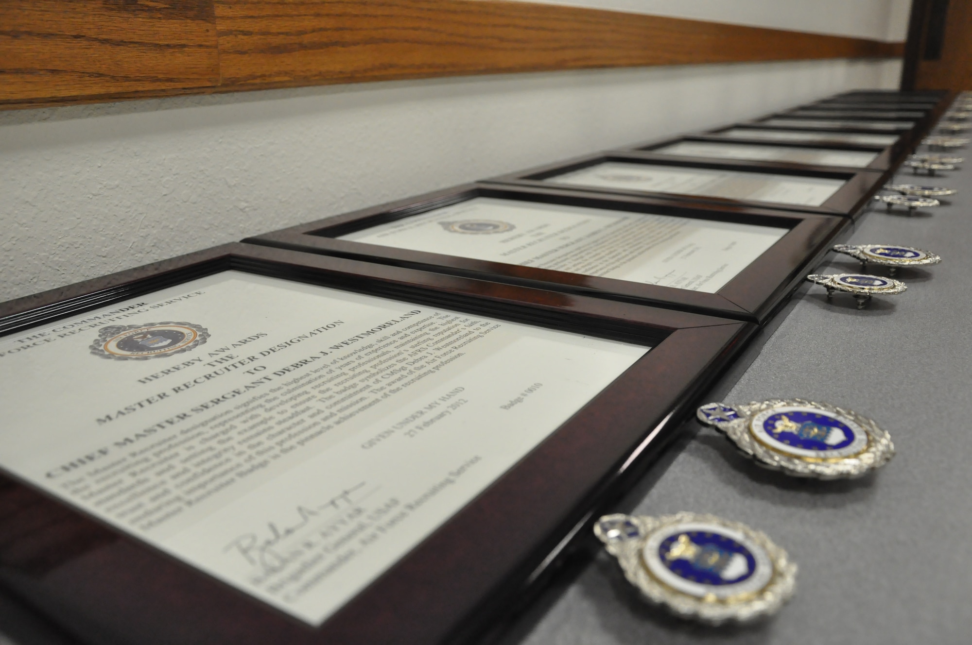 Ten Air Force  recruiters were presented with the new Master Recruiter designation badge at Air Force Recruiting Service headquarters in San Antonio, Texas. The master recruiter designation symbolizes the AFRS commander’s faith, trust and confidence in the character and commitment of senior recruiters to the enduring importance of the recruiting profession and mission. The master recruiter is charged with developing recruiting professionals, maintaining the highest standards and setting the example to ensure the recruiting profession’s reputation for excellence and integrity remains steadfast. (U.S. Air Force/Staff Sgt. Hillary Stonemetz)