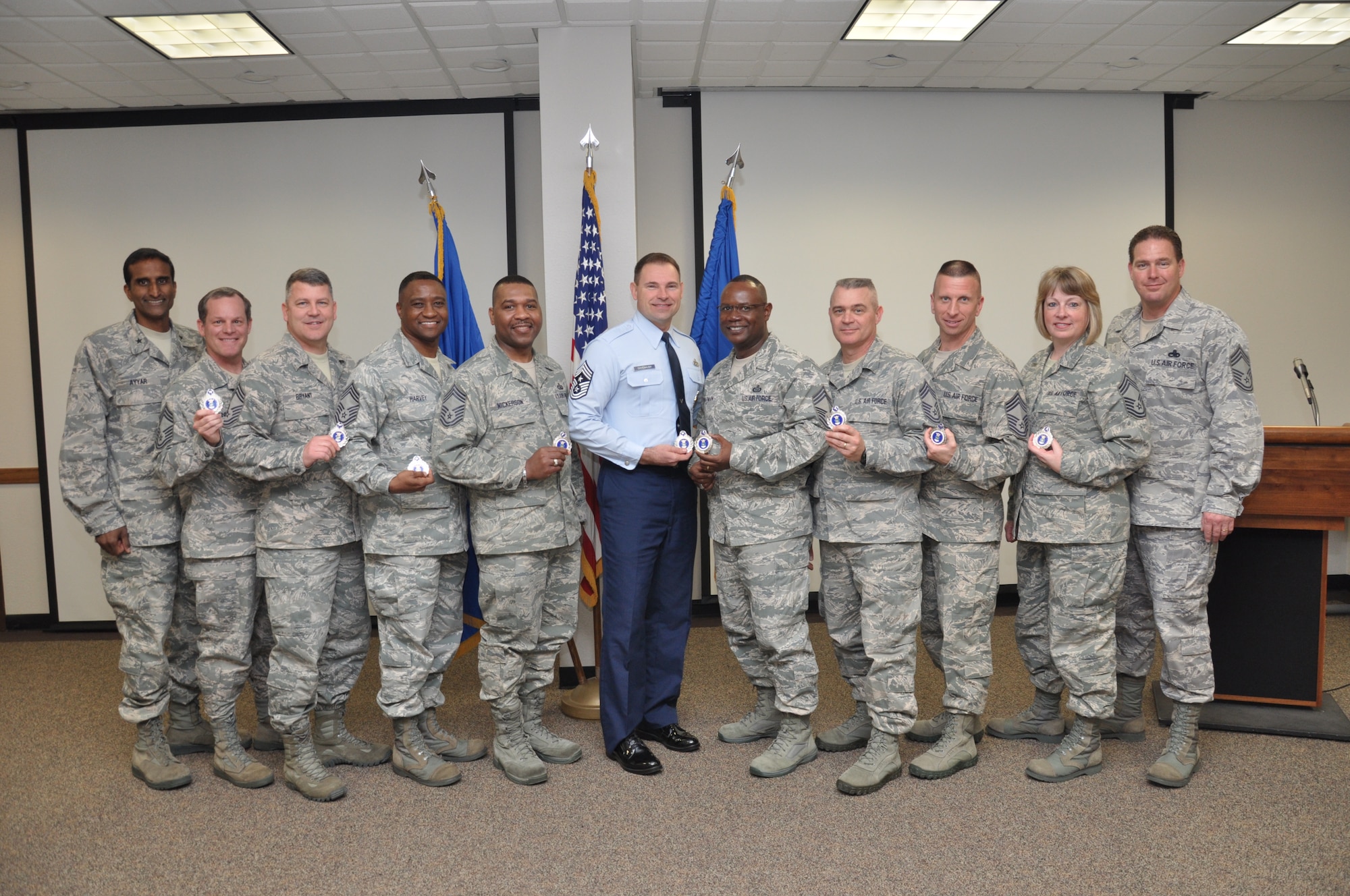 Brig. Gen. Balan Ayyar, Air Force Recruiting Service commander, presented 10 Chief Master Sergeants with new Master Recruiting designation badges at a ceremony here Feb. 29. From left to right: Brig. Gen. Balan Ayyar, Chief Master Sgt. Jason Kenney, Chief Master Sgt. John Bryant, Chief Master Sgt. Lester Harvey, Chief Master Sgt. James Nickerson, Command Chief Master Sgt. William Cavenaugh, Chief Master Sgt. Ernest Chapman, Chief Master Sgt. Scott Haskins,  Chief Master Sgt. George Skender, Chief Master Sgt. Debra Westmoreland, and Chief Master Sgt. Bradley Elkjer. (U.S. Air Force photo/Staff Sgt. Hillary Stonemetz)