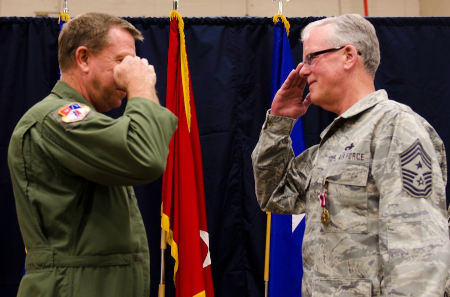Missouri Air National Guard's Command Chief Master Sgt. William D. Phillips salutes Assistant Adjutant General Steven Cotter, Rosecrans Air National Guard base, St. Joseph, Mo., March 3, 2012. Chief Phillips has over 40 years of service in the Air National Guard and started out as a member, here, at the 139th Airlift Wing. (U.S. Air Force Photo by Senior Airman Kelsey Stuart)