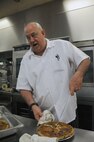 Mike Young, 902nd Force Support Squadron chef, puts the finishing touches on a dish for a luncheon at the Kendrick Club- Joint Base San Antonio-Randolph Feb. 28. (U.S. Air Force Photo by Don Lindsey)