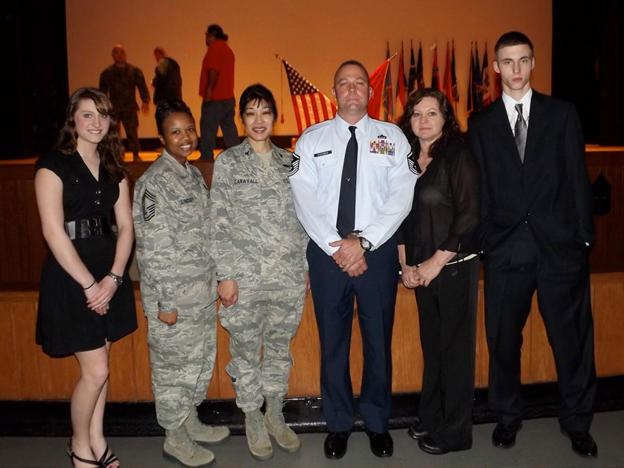 U.S. Air Force Master Sgt. Matthew Stathakis poses for a photo with his family and co-workers during a Senior NCO Academy graduation at Camp Lejeune, N.C., Feb. 24, 2012. Stathakis spent seven weeks at the Marine camp studying leadership, communications and war fighting techniques. Stathakis, 4th Medical Group first sergeant, hails from Deerfield Beach, Fla. (Courtesy photo)