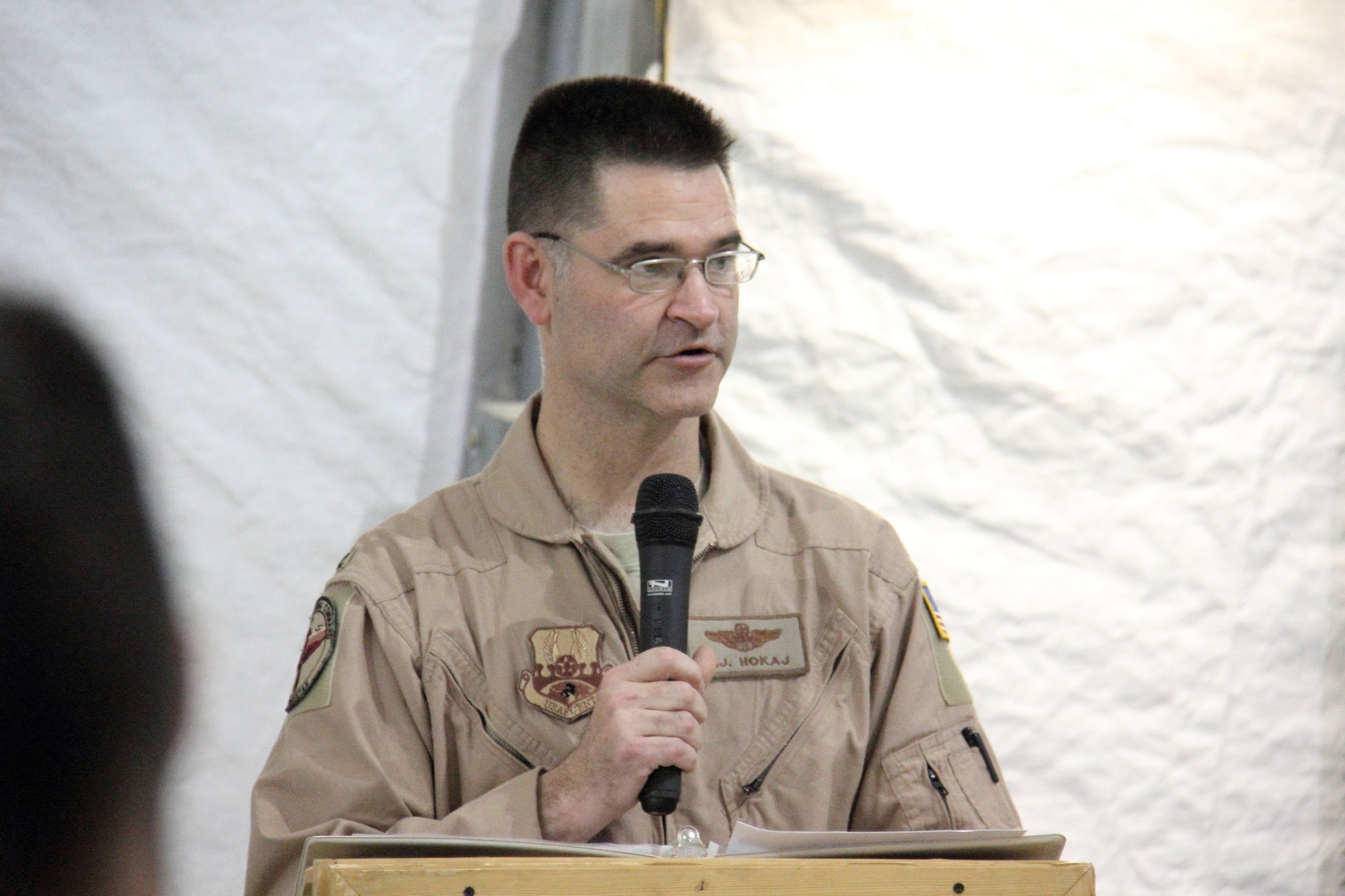 Air Force Col. John Hokaj, commander of the 838th Air Expeditionary Air Advisory Group, speaks during a dedication ceremony for Maj. Raymond Estelle II, Feb, 27, 2011. Estelle lost his life April 27, 2011, during a shooting incident at the Afghan Command and Control Center in the Afghanistan air force headquarters, North Kabul International Airport. (Italian. air force photo by Tech. Sgt. My Luciano)