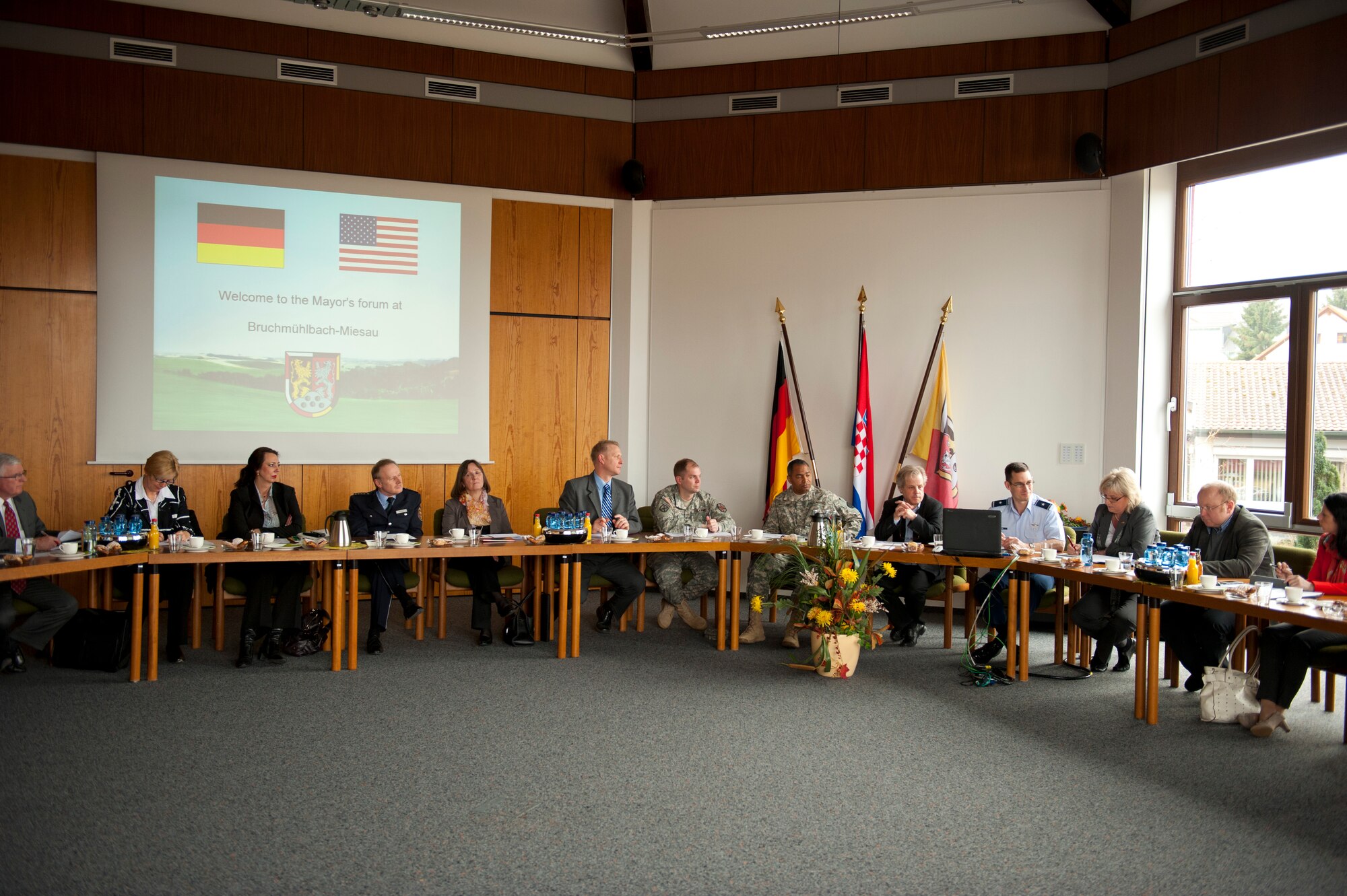 U.S. Air Force and Army officials along with a group of local German mayors, assembled for the Mayors' Forum at the Bruchmuehlbach-Miesau Rathaus, Feb. 29, 2012. The Mayors’ Forum is held twice a year in different towns of the region and it provides U.S. military and host nation officials the opportunity to exchange information, and especially for local mayors to raise issues directly with top KMC military leadership in an informal setting. (U.S. Air Force photo by Senior Airman Stephen J. Otero)