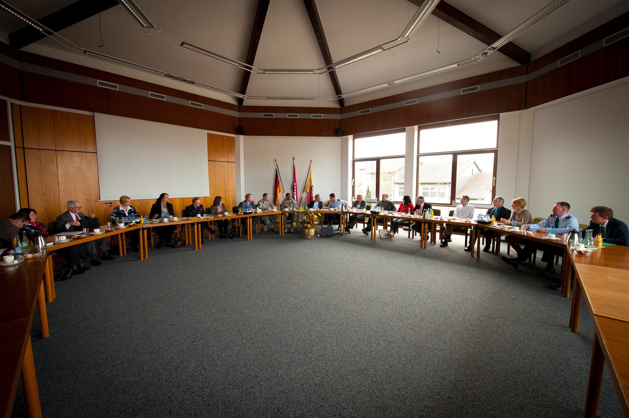 U.S. Air Force and Army officials along with a group of local German mayors, assembled for the Mayors' Forum at the Bruchmuehlbach-Miesau Rathaus, Feb. 29, 2012. The Mayors’ Forum is held twice a year in different towns of the region and it provides U.S. military and host nation officials the opportunity to exchange information, and especially for local mayors to raise issues directly with top KMC military leadership in an informal setting. (U.S. Air Force photo by Senior Airman Stephen J. Otero)