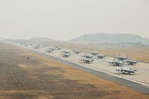 A formation of F-16 Fighting Falcons progresses down the flight line at Kunsan Air Base, Republic of Korea, March 2, 2012, in a show of power called an “Elephant Walk.” The exercise showcased Kunsan AB aircrews' capability to quickly and safely prepare an aircraft for a wartime mission. (U.S. Air Force photo by Senior Airman Brittany Y. Auld/Released)