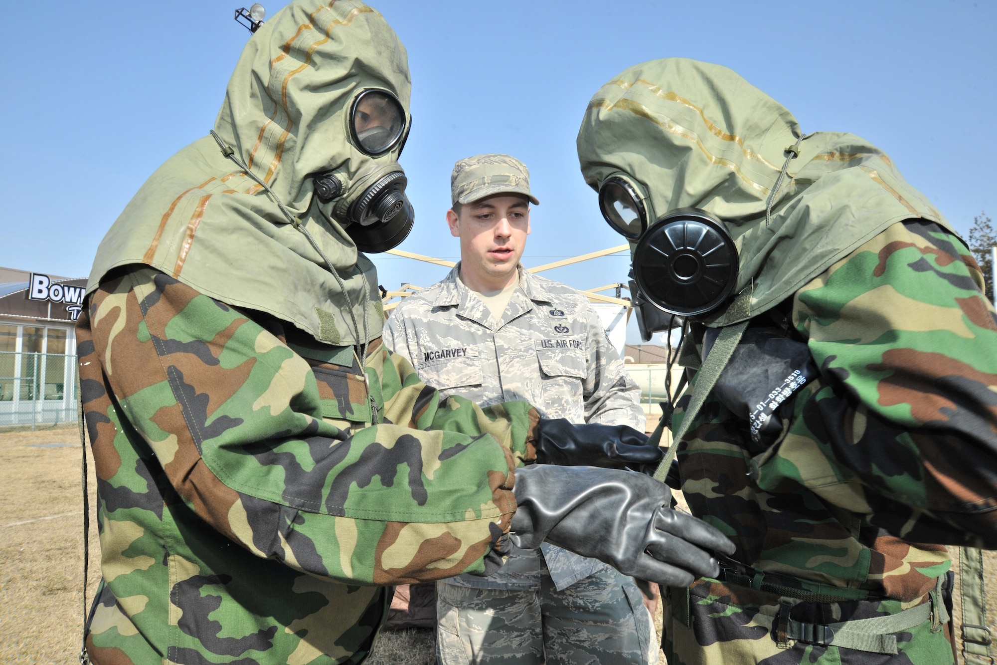 Republic of Korea Air Force and Army personnel participate in counter chemical, biological, radiological, nuclear and explosive training led by 8th Civil Engineer Squadron readiness flight and emergency management Airmen at Kunsan Air Base, ROK, Feb. 29, 2012. The training involved joint post attack chemical, biological and radiological reconnaissance operations to determine the extent of CBRN hazards to the installation. (U.S. Air Force photo by Senior Airman Brittany Y. Auld/Released)