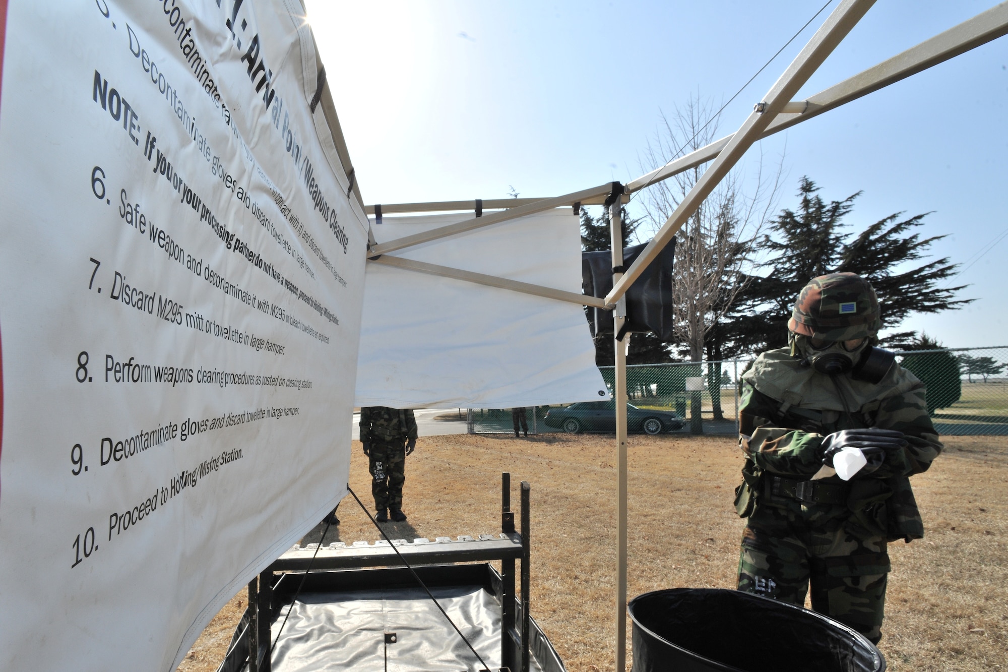 Republic of Korea Air Force and Army personnel participate in counter chemical, biological, radiological, nuclear and explosive training led by 8th Civil Engineer Squadron readiness flight and emergency management Airmen at Kunsan Air Base, ROK, Feb. 29, 2012. The training involved joint post attack chemical, biological and radiological reconnaissance operations to determine the extent of CBRN hazards to the installation. (U.S. Air Force photo by Senior Airman Brittany Y. Auld/Released)