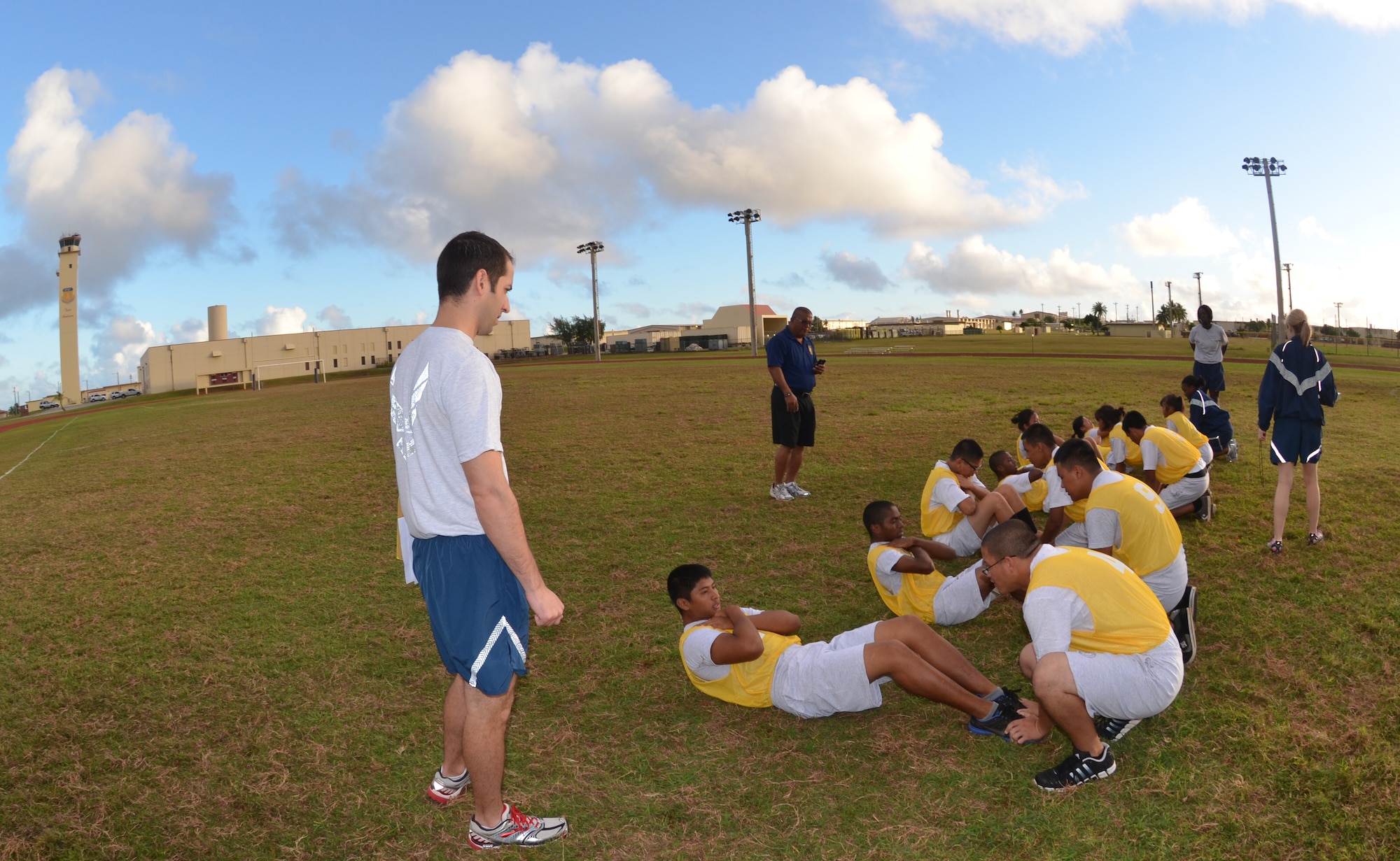 Reserve Officer Training Corps cadets for John F. Kennedy High School in
Tumon, Guam, participate in a standardized Air Force physical fitness test
conducted by 36th Force Support Squadron members Feb. 26 curing a base tour.
As well as conducting the test, the 36 FSS members emphasized the importance
of PT and stressed Andersen's 90 at 90 initiative, where Airmen are striving
for a 90 percent on their PT tests.  (U.S. Air Force photo/Senior Airman
Veronica McMahon)
  
