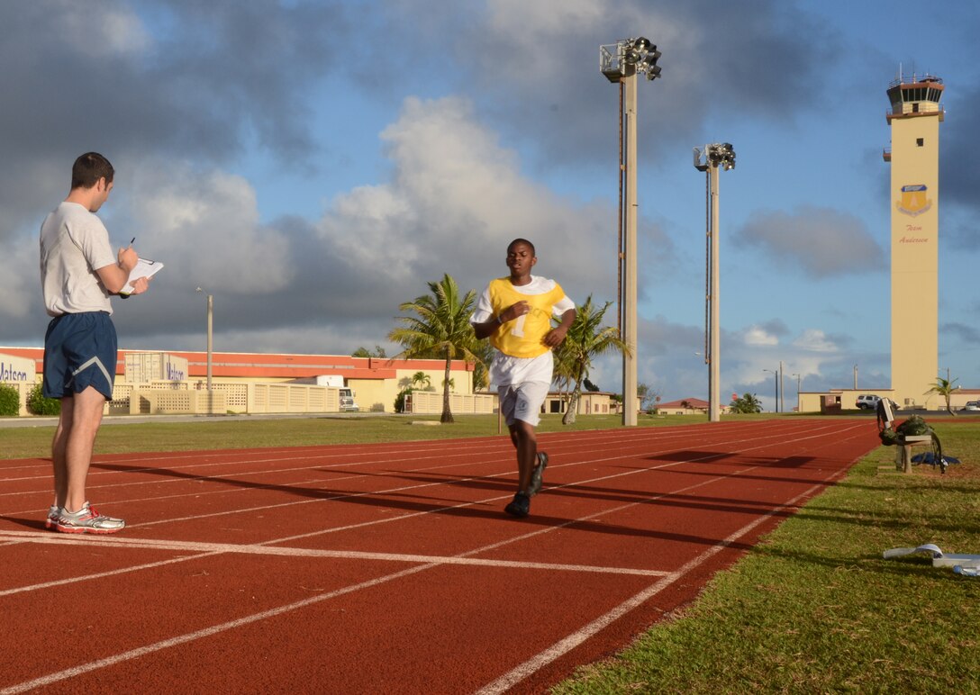 Reserve Officer Training Corps cadets for John F. Kennedy High School in
Tumon, Guam, participate in a standardized Air Force physical fitness test
conducted by 36th Force Support Squadron members Feb. 26 curing a base tour.
As well as conducting the test, the 36 FSS members emphasized the importance
of PT and stressed Andersen's 90 at 90 initiative, where Airmen are striving
for a 90 percent on their PT tests.  (U.S. Air Force photo/Senior Airman
Veronica McMahon)
  
