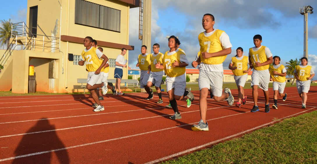 Reserve Officer Training Corps cadets for John F. Kennedy High School in
Tumon, Guam, participate in a standardized Air Force physical fitness test
conducted by 36th Force Support Squadron members Feb. 26 curing a base tour.
As well as conducting the test, the 36 FSS members emphasized the importance
of PT and stressed Andersen's 90 at 90 initiative, where Airmen are striving
for a 90 percent on their PT tests.  (U.S. Air Force photo/Senior Airman
Veronica McMahon)
  
