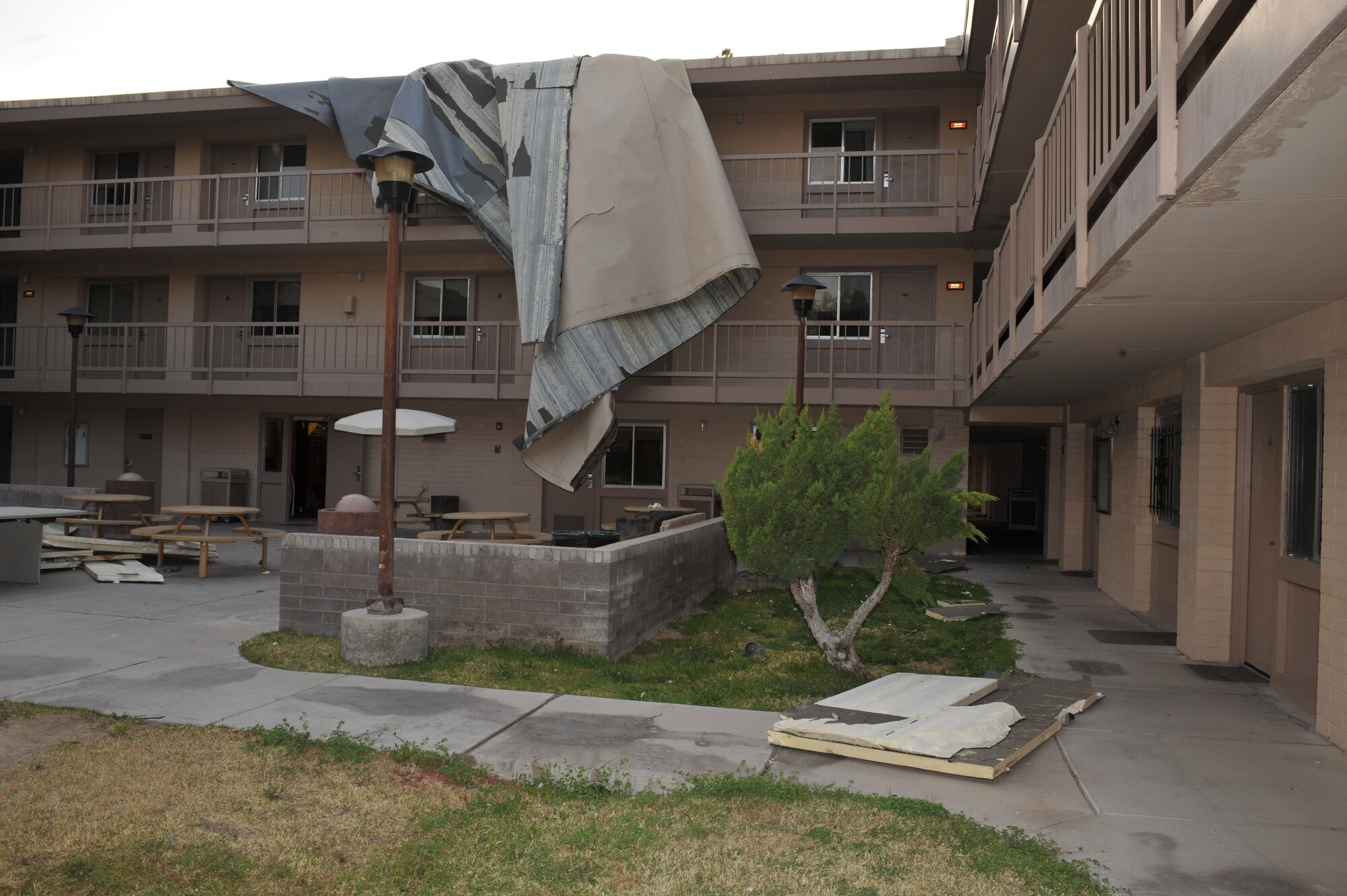 The Nellis Inn sustained heavy roof damage as a result of high winds, March 6, 2012 at Nellis Air Force Base, Nev. Winds of greater than 30 mph with gusts of up to 63 mph caused power outages, flight delays and property damage throughout the valley surrounding Las Vegas. (U.S. Air Force photo by Airman 1st Class Daniel Hughes)