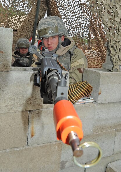 U.S. Air Force Airman 1st Class Austin Harr provides overwatch during the Phase II Operational Readiness Exercise on Seymour Johnson Air Force Base, N.C., March 7, 2012.Providing overwatch ensures unauthorized personnel don’t enter the base perimeter. Harr, 4th Security Forces Squadron patrolman, hails from Goldsboro, N.C. (U.S. Air Force photo/Senior Airman Gino Reyes/Released)