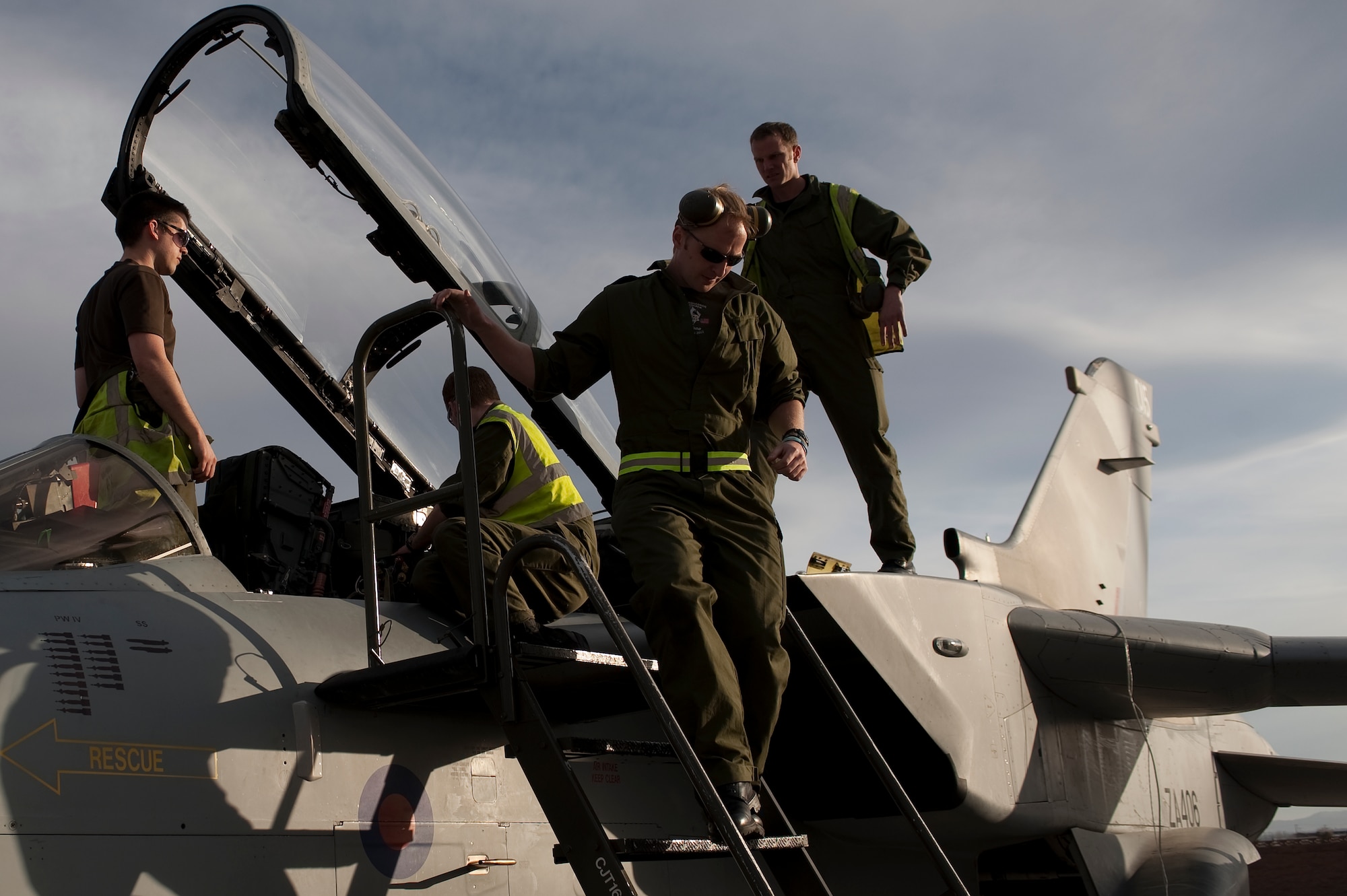 Royal Air Force of the United Kingdom Airmen, 2nd Army Cooperation Squadron, RAF Marham, conduct preventive maintenance on a GR4 Tornado, during Red Flag 12-3 March 5, 2012, at Nellis Air Force Base, Nev. Red Flag is a realistic combat training exercise involving the air forces of the United States and its allies.(U.S. Air Force photo by Staff Sgt. Christopher Hubenthal)
