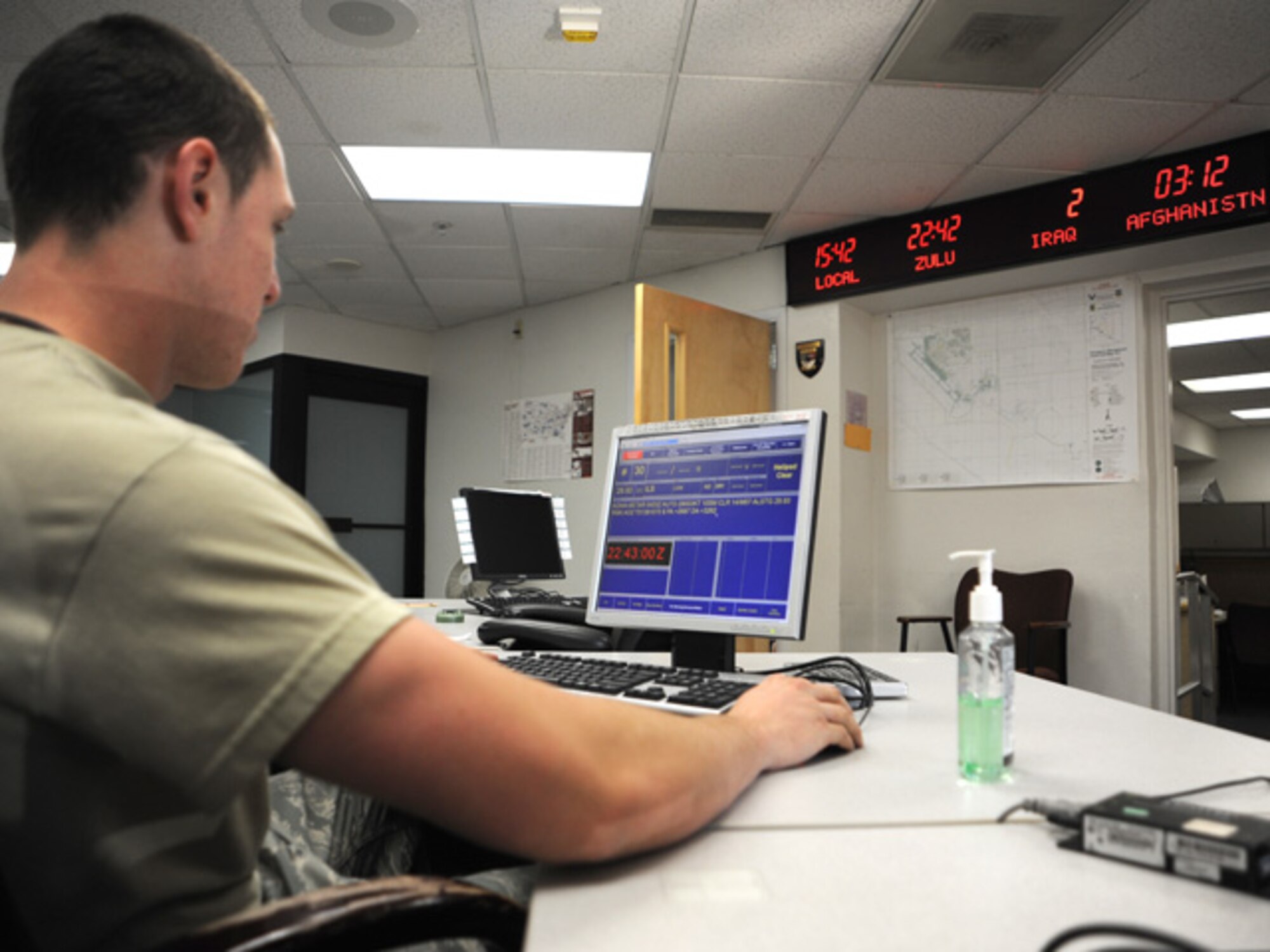 U.S. Air Force Senior Airman Justin Holbrook, 355th Operation Support Squadron, relays information to the Air Traffic Control Tower during an Operational Readiness Exercise at Davis-Monthan Air Force Base, Ariz., February 22. (U.S. Air Force photo by A1C Camilla Griffin/Released)
