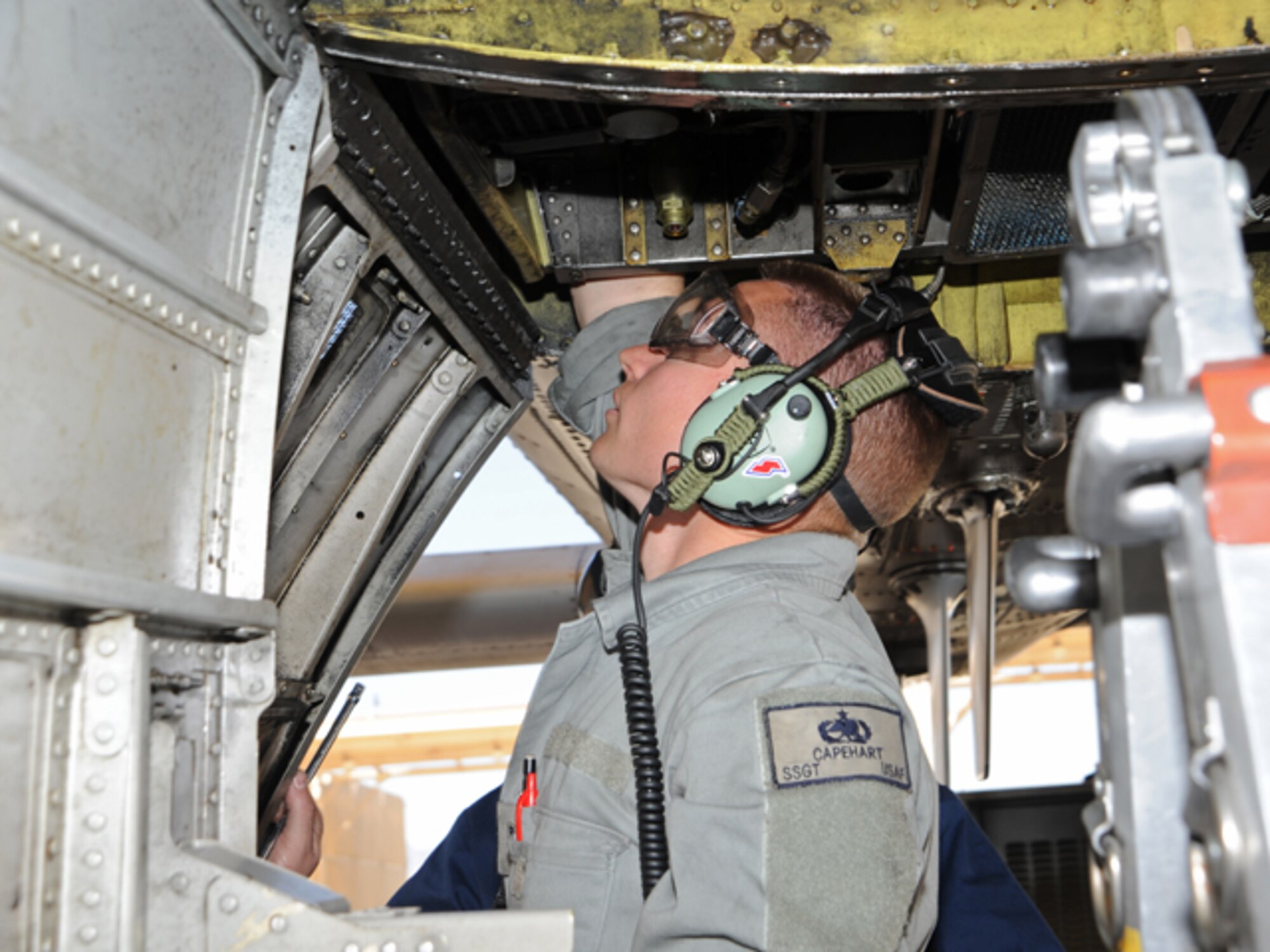 U.S. Air Force Staff Sgt Chase Capehart, 355th Aircraft Maintenance Squadron, performs maintenance on an A-10 Warthog during an Operational Readiness Exercise at David-Monthan Air Force Base, Ariz., February 22. (U.S. Air Force photo by A1C Camilla Griffin/Released)