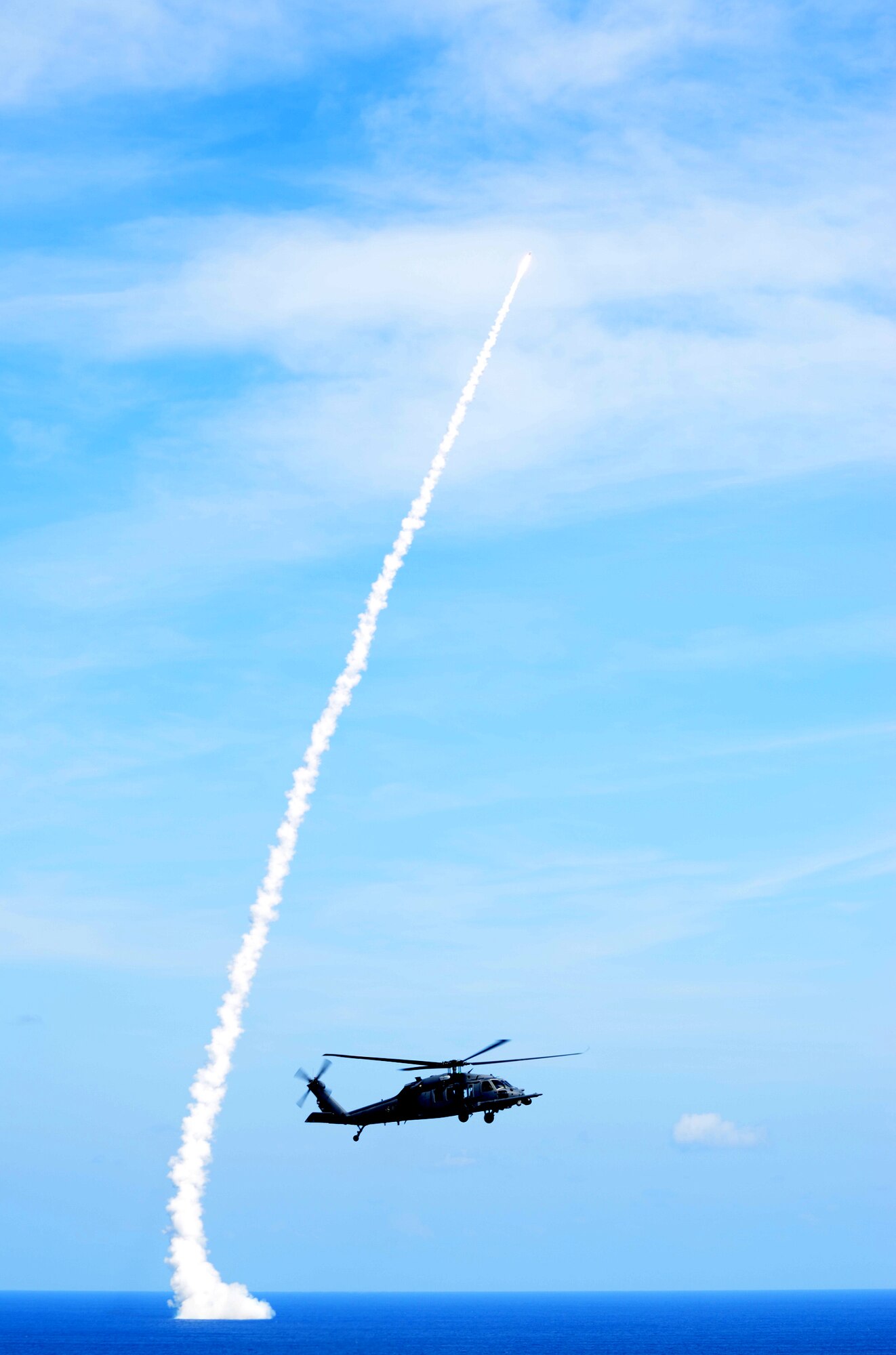 Airmen from the 920th Rescue Wing, Patrick Air Force Base, Fla., cleared the launch path of mariners in an HH-60G Pave Hawk helicopter off the nearby coast of Cape Canaveral Air Force Station to allow the safe launch of D-5 Trident Missile Feb. 22. The U.S. Navy's USS Tennessee, an Ohio-class ballistic missile submarine, underwent demonstration and shakedown operations (DASO) and successfully fired the D-5 Trident test missile off the coast of Cape Canaveral Feb. 22. (U.S. Air Force photo/Capt. Cathleen Snow)