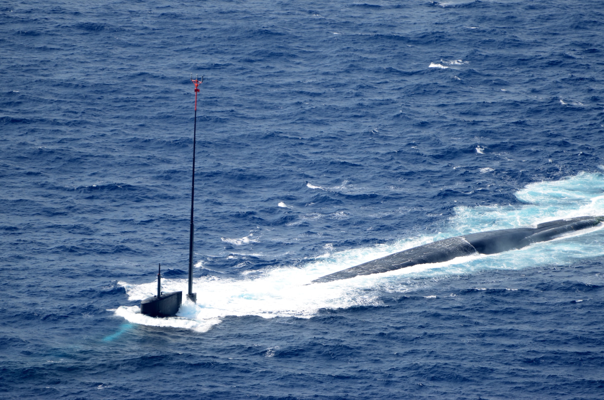On 22 Feb, the USS Tennessee, a Naval Ohio-class ballistic missile submarine, underwent demonstration and , shakedown operations (DASO) and successfully fired an D-5 Trident test missile off the coast of Cape Canaveral, Fla. Prior to sub submerging, Airmen of the 920th Rescue Wing, at nearby Patrick Air Force Base, cleared the launch path beneath the missile of mariners to allow a safe test. (U.S. Air Force photo/Capt. Cathleen Snow)