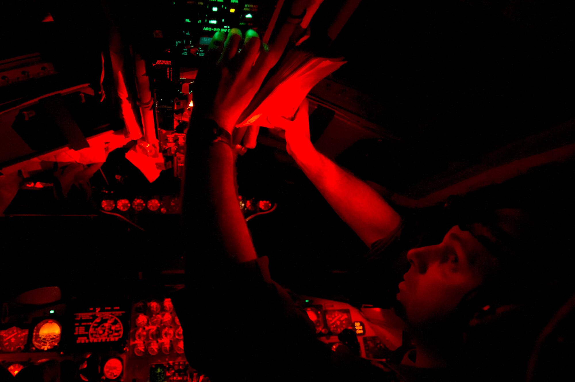 Capt. Michael Plourde, B-52H Stratofortress co-pilot, 96th Bomb Squadron, Barksdale Air Force Base, La., completes in-flight checklists during Exercise Red Flag, March 3, 2012. Red flag trains pilots from the U.S., NATO and other allied countries for realistic combat scenarios. The B-52 performs a dual-role mission, nuclear and conventional, providing a rapid global strike capability and ability to reach hardened and buried targets anywhere and at anytime. (U.S. Air Force photo by Tech. Sgt. Bradley C. Church)(Released)
