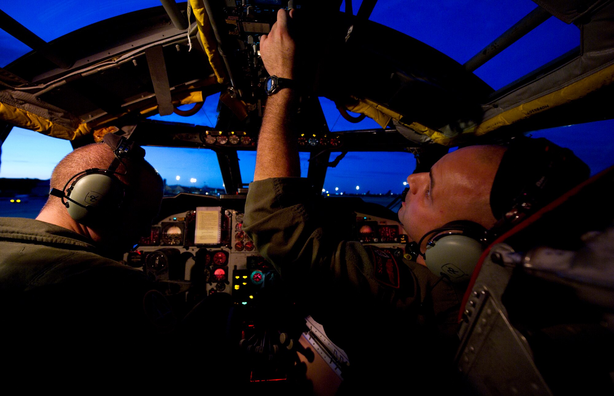 (Left) Capt. Andrew Embry, B-52H Stratofortress aircraft commander,  and (Right) Capt. Michael Plourde, co-pilot, 96th Bomb Squadron, Barksdale Air Force Base, La., complete pre-flight checklists during Exercise Red Flag, March 3, 2012. Exercise Red Flag trains pilots from the U.S., NATO and other allied countries for realistic combat scenarios. The B-52 performs a dual-role mission, nuclear and conventional, providing a rapid global strike capability and ability to reach hardened and buried targets anywhere and at anytime.  (U.S. Air Force photo by Tech. Sgt. Bradley C. Church)(Released)
