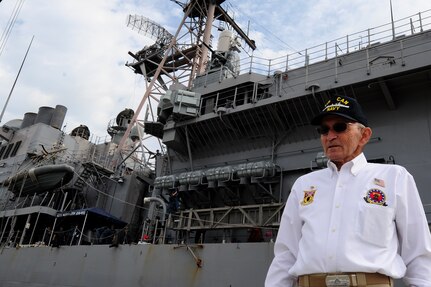 (Ret.) Master Chief Petty Officer Samuel Kirton takes Airmen from Joint Base Charleston - Air Base to Patriots Point and Naval Maritime Museum in Charleston for the arrival of the USS Normandy (CG-60) Feb. 24. Kirton works in the heating, venting and air conditioning shop at JB Charleston - Air Base. (U.S. Air Force Photo / Staff Sgt. Nicole Mickle)