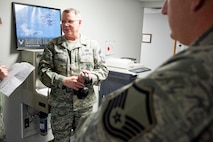 Chief Master Sgt. Thomas Powner, a 910th Civil Engineer Squadron fire chief, comments on his experience with combat arms training during a 30-year career that involved five deployments to Iraq and Afghanistan. 910th Combat Arms Training and Maintenance conducts weapons courses each Unit Training Assembly in preparation for the 2013 Operational Readiness Inspection and to meet training requirements. U.S. Air Force photo by Eric M. White.