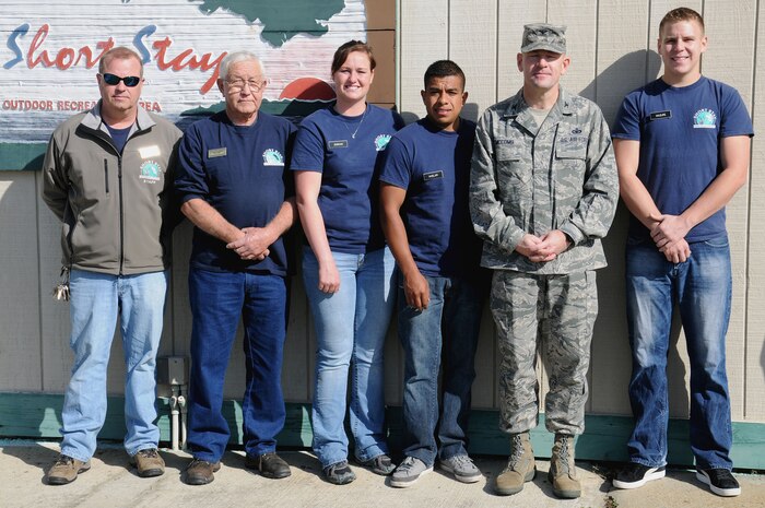 Left, Richard Hahn, Matt Vacher, Petty Officer 3rd Class Sharon Duncan, Petty Officer 3rd Class Juan Avelar, Col. Richard McComb and Petty Officer 3rd Class Chandler Mazure take a moment to pose for a photograph after McComb presented each of them with a command coin at Short Stay Navy Outdoor Recreation Area at Lake Moultrie in Moncks Corner, S.C., Mar. 7. The staff members and Sailors were directly involved with rescuing the lives of two elderly gentlemen whose boat overturned in Lake Moultrie near Short Stay Jan. 17. McComb is the Joint Base Charleston commander, Hahn is the Short Stay assistant manager, Vacher is the Short Stay sailing director, Duncan is an electronics technician assigned to Naval Nuclear Power Training Command, Avelar is a machinist’s mate assigned to NNPTC and Mazure is a machinist’s mate assigned to Nuclear Power Training Unit. A fourth Sailor, Petty Officer Justin Keene also assisted in the rescue but has already transferred to his next assignment at the Nuclear Power Training Unit in Ballston, Spa, N.Y. (U.S. Navy photo/Petty Officer 2nd Class Brannon Deugan)