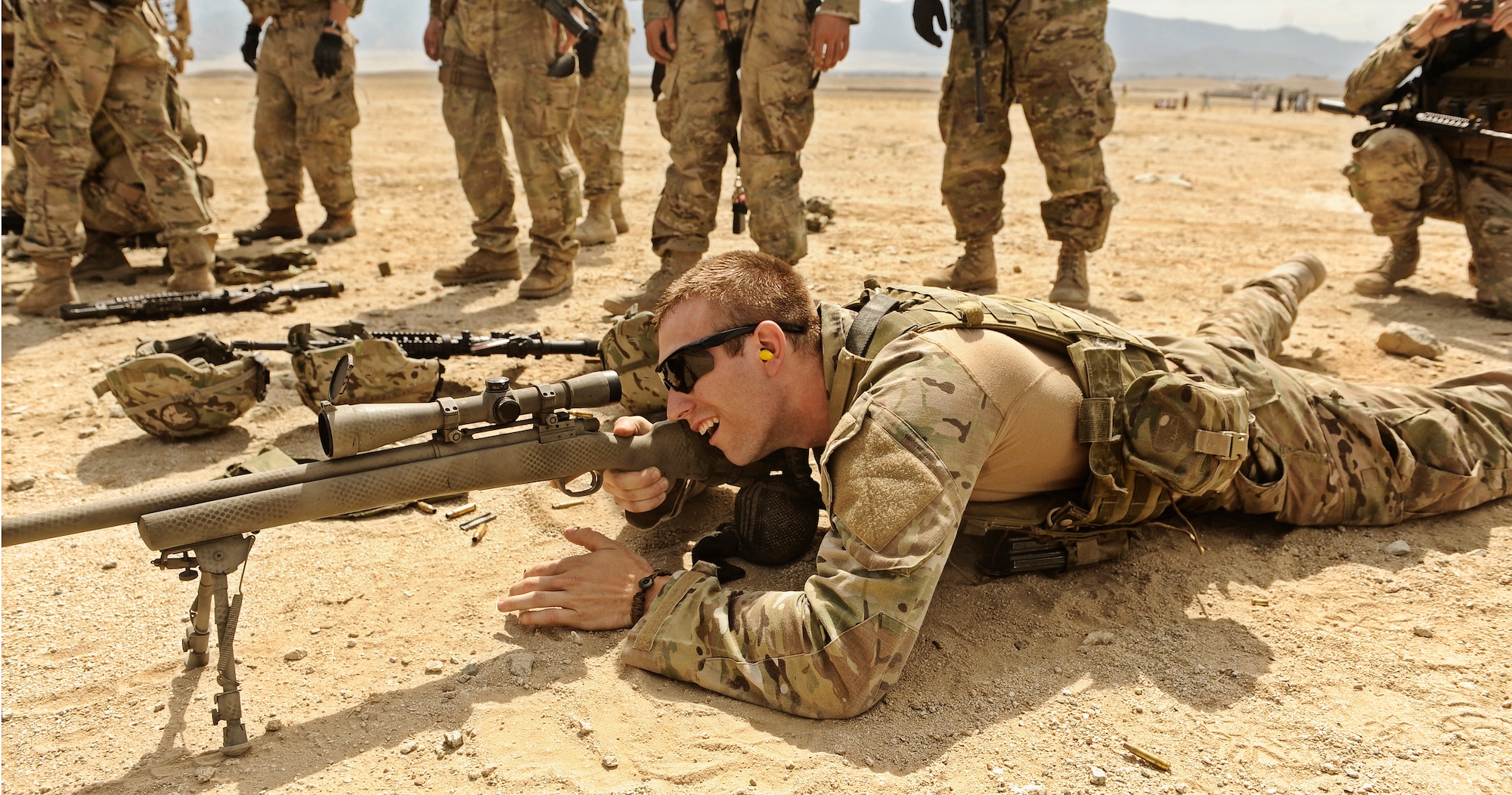 Staff Sgt. Ryan Crane, combat cameraman attached to Laghman Provincial Reconstruction Team, fires an M24 sniper rifle during a qualification course at the Black Hills firing range in Laghman Province Sept. 3, 2011. Members from the PRT take turns practicing with multiple weapons systems to ensure they are proficient. (U.S. Air Force photo/ Capt. Tony Vincelli)