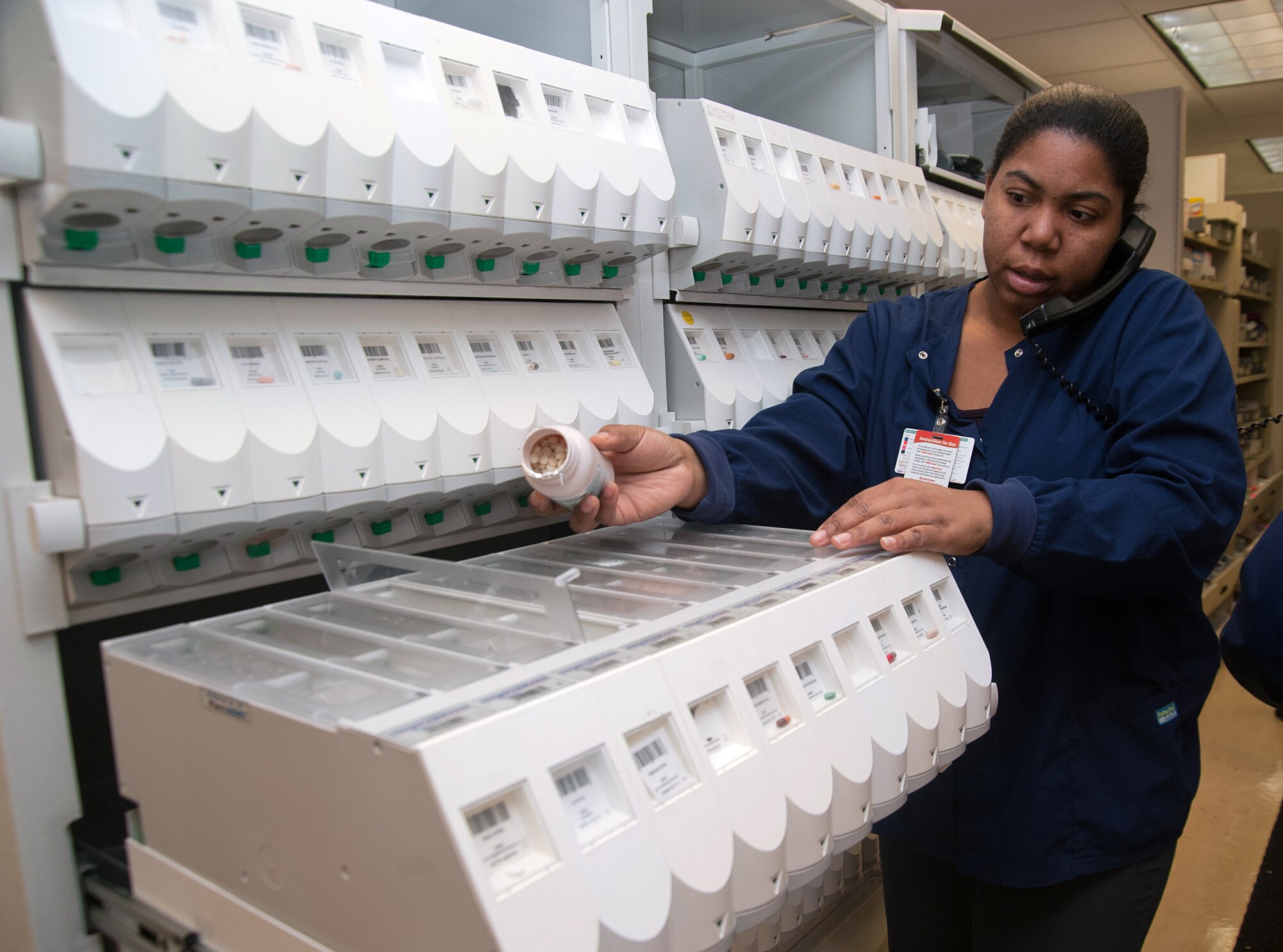 A 779th Medical Support Squadron pharmacy technician counts pills at the Malcolm Grow Medical Center Main Pharmacy on March 6. The main pharmacy administers more than 350,000 medications annually. (Photo/Bobby Jones)