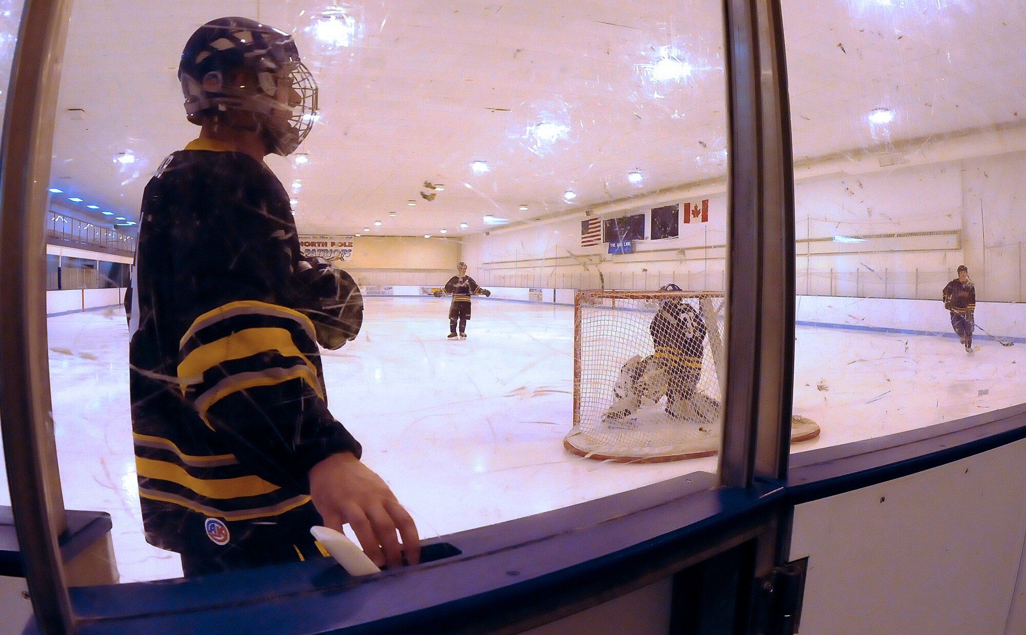 U.S. Air Force Tech. Sgt. Joe Straub, captain of the Eielson Icemen, steps out onto the ice during a practice session March 1, 2012, at Polar Ice Center Ice Skating Rink, Fairbanks, Alaska. Straub is the fitness operations NCO in charge at the 354th Force Support Squadron. (U.S Air Force Photo/Airman 1st Class Zachary Perras)